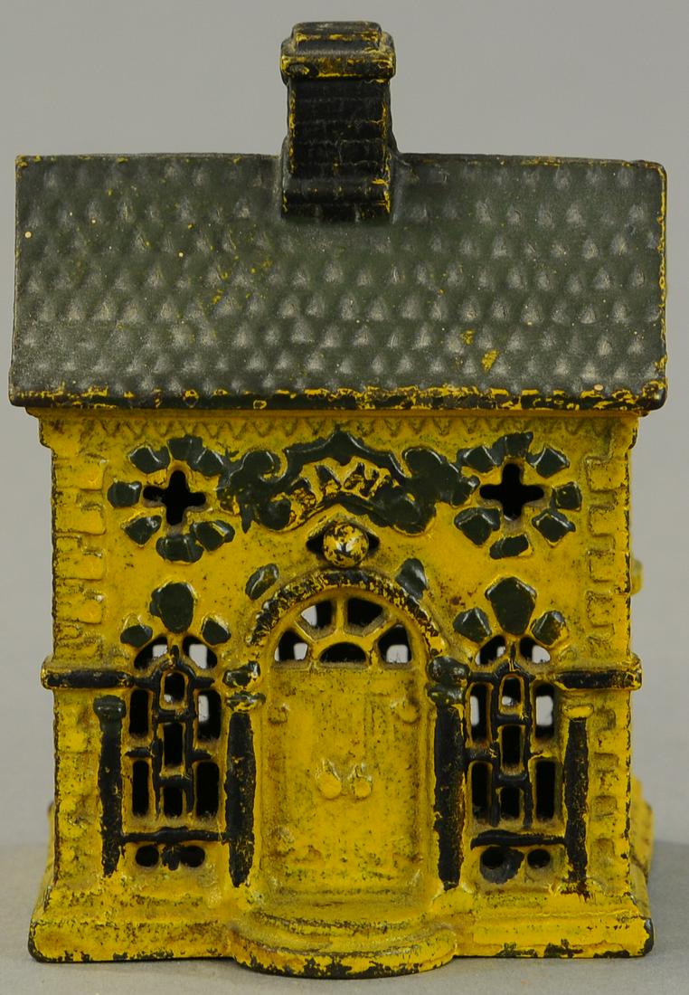 GREY IRON CO. PAINTED ROOF BUILDING STILL BANK: 62. GREY IRON CO. PAINTED ROOF BUILDING STILL BANK | 5.5" h. | (Exc. Cond.) | $400 - $600