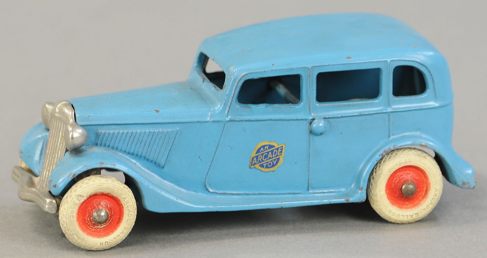 ARCADE 1933 FORD SEDAN: 256. ARCADE 1933 FORD SEDAN | Provenance: Jack Johnson Collection. 7" l. | (Pristine - Near Mint Cond.) | $500 - $750