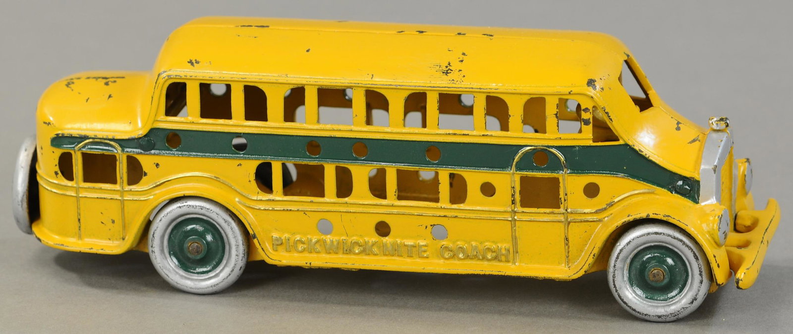 KENTON PICKWICK NIGHT COACH: 391. KENTON PICKWICK NIGHT COACH | 11" l. | Reflects OK under UV blacklight, though appears to be Restored. | $700 - $1,000