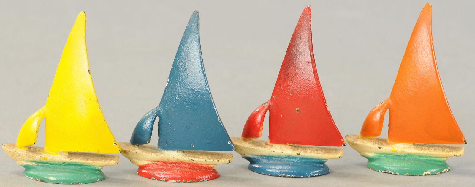 SET OF FOUR SAILBOAT PLACE CARD HOLDERS: 444. SET OF FOUR SAILBOAT PLACE CARD HOLDERS | Possibly Spencer. 3" h. | (Exc. Cond.) | $150 - $300