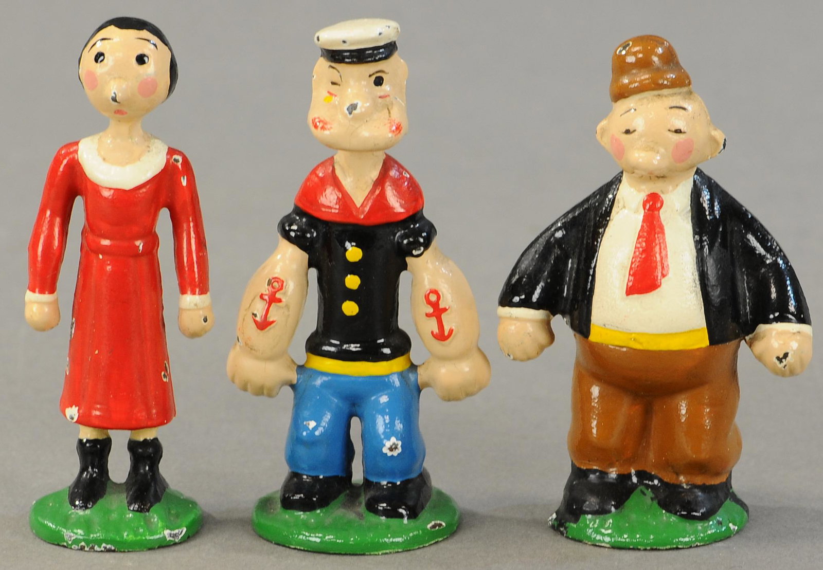 HUBLEY POPEYE & FRIENDS PAPERWEIGHTS: 445. HUBLEY POPEYE & FRIENDS PAPERWEIGHTS | 3.25" - 3.5" h. | (Pristine Cond.) | $200 - $400