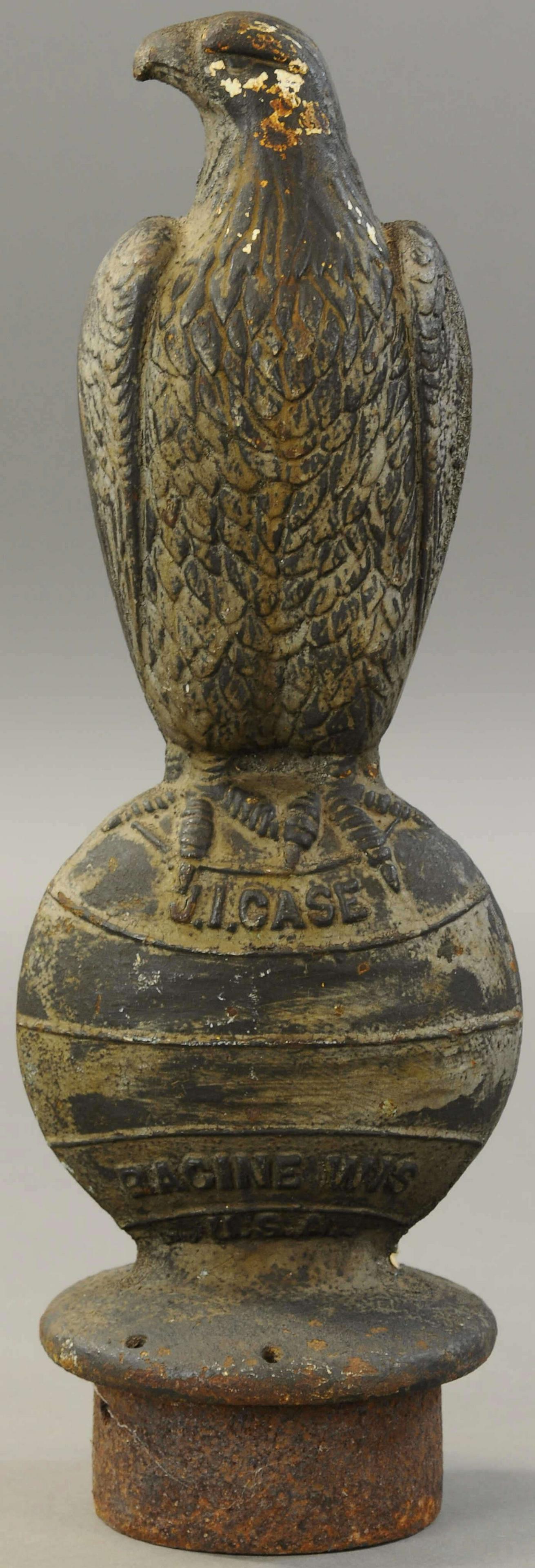 EARLY J.I. CASE EAGLE EMBLEM: 494. EARLY J.I. CASE EAGLE EMBLEM | Majestic eagle atop globe, advertising Case tractors. 19" h. | (VG Cond.) | $600 - $900
