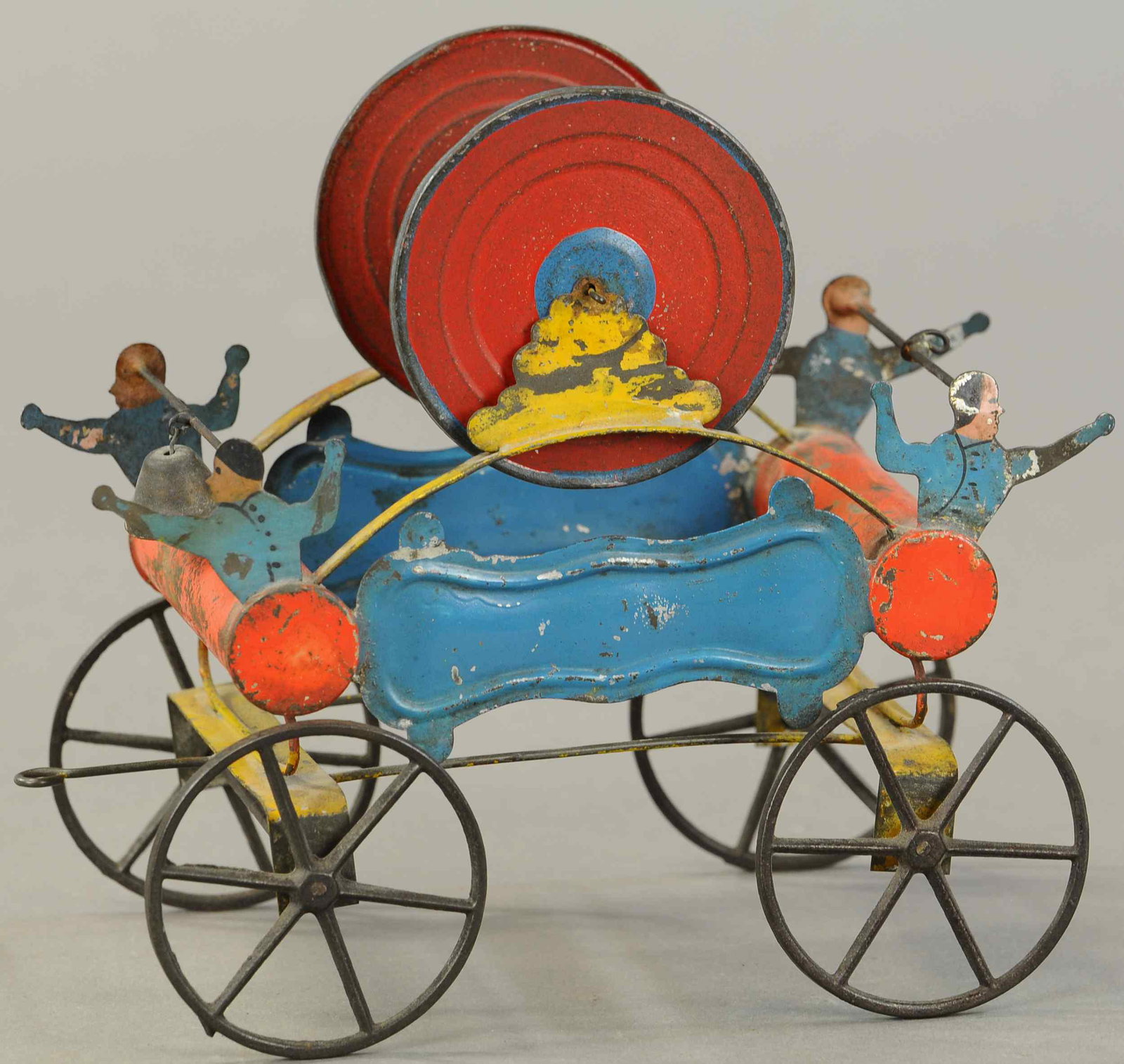 ALTHOF BERGMANN HOSE REEL: 511. ALTHOF BERGMANN HOSE REEL | Very rare example, circa 1870, hand painted pull toy, features four die-cut firemen on each corner, stenciled "Antelope" at front. Provenance: Max Berry Collection. 7"