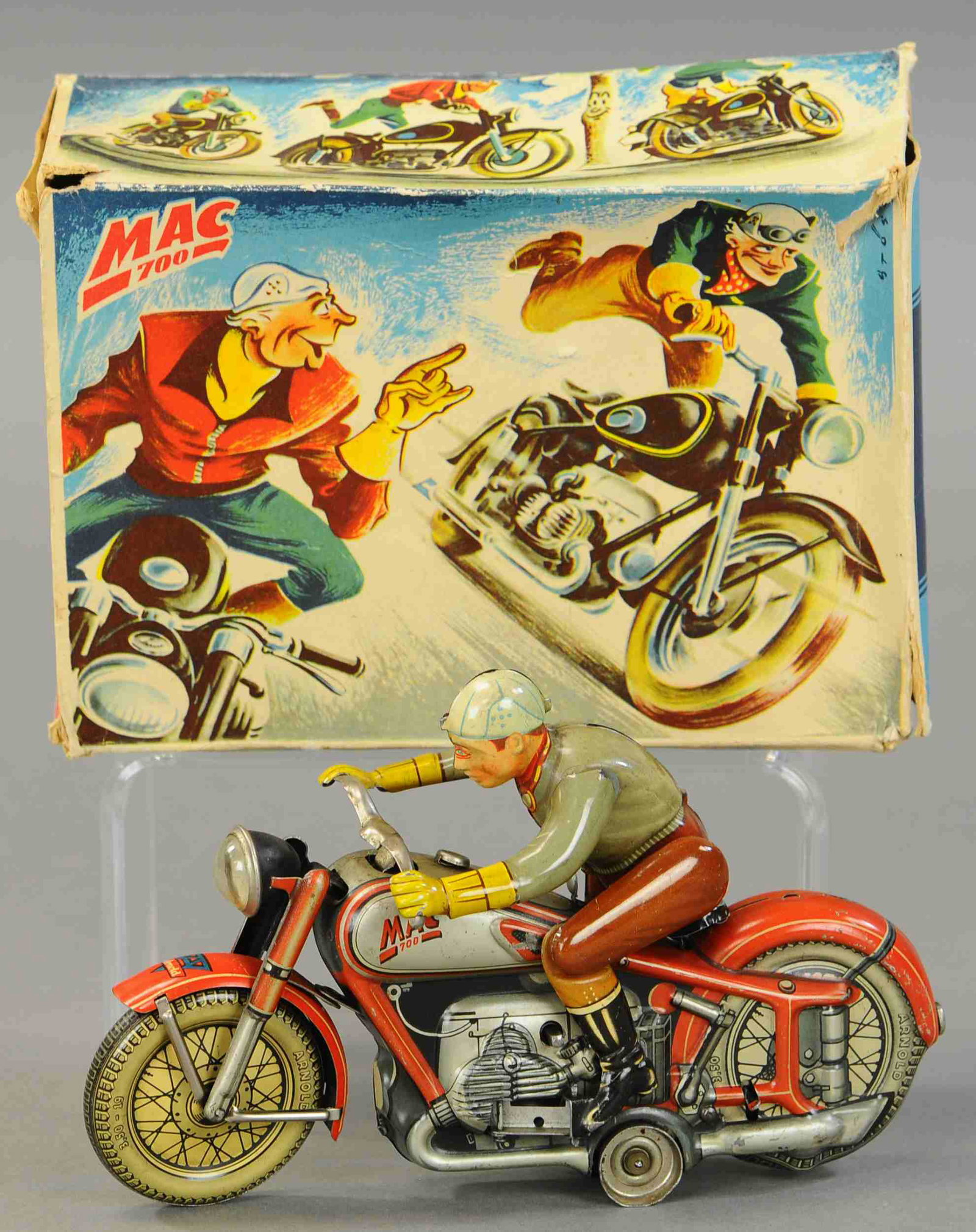 BOXED ARNOLD MAC 700 MOTORCYCLE: 1018. BOXED ARNOLD MAC 700 MOTORCYCLE | 8" l. | Box has some crushing, cycle in (Exc. Cond.) | $500 - $750