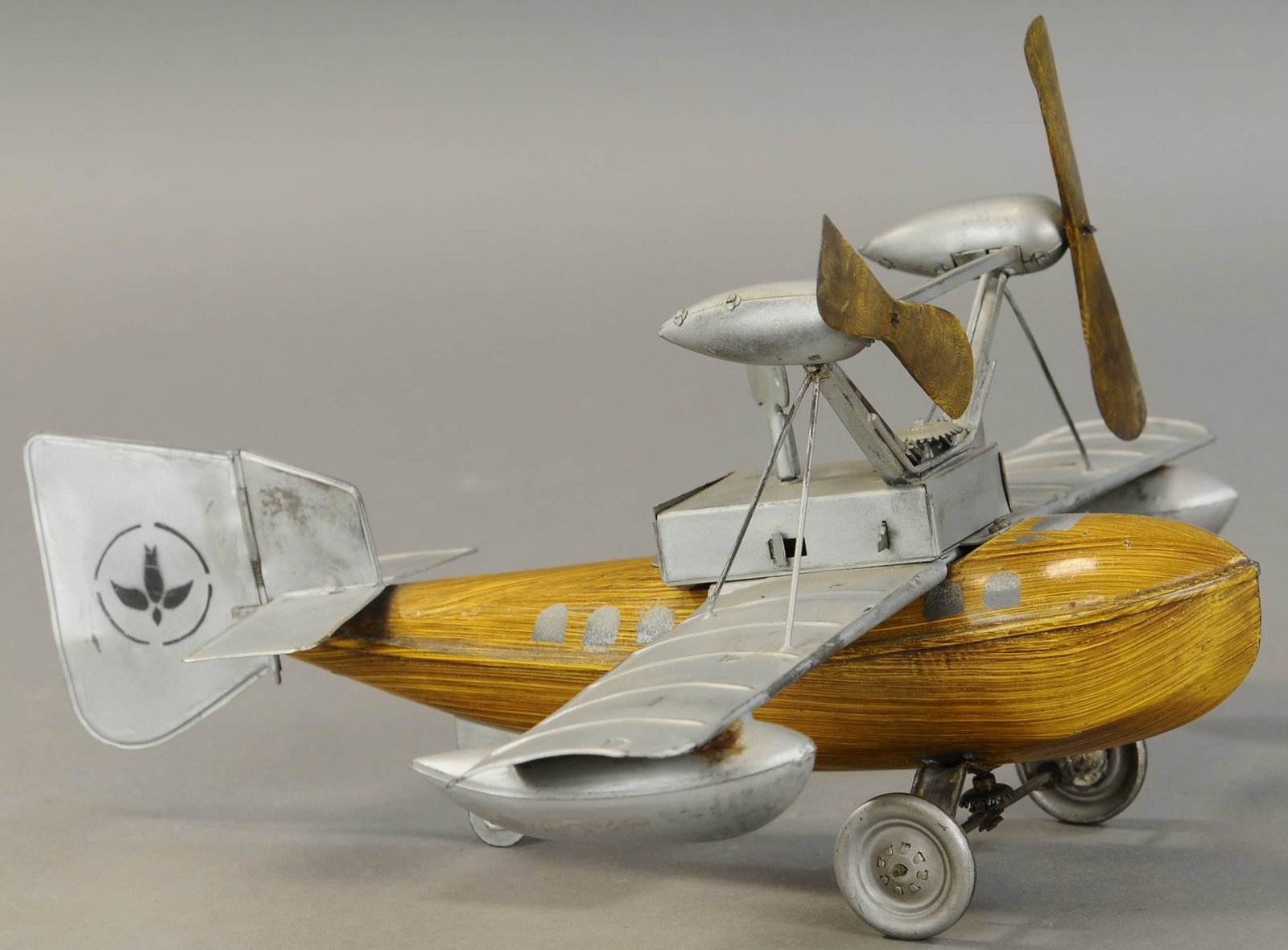BING AMPHIBIOUS AIRPLANE: 1053. BING AMPHIBIOUS AIRPLANE | Provenance: Donald Kaufman Collection. 16" wingspan. | Repair to rear wing, (Exc. Cond.) | $1,000 - $1,500