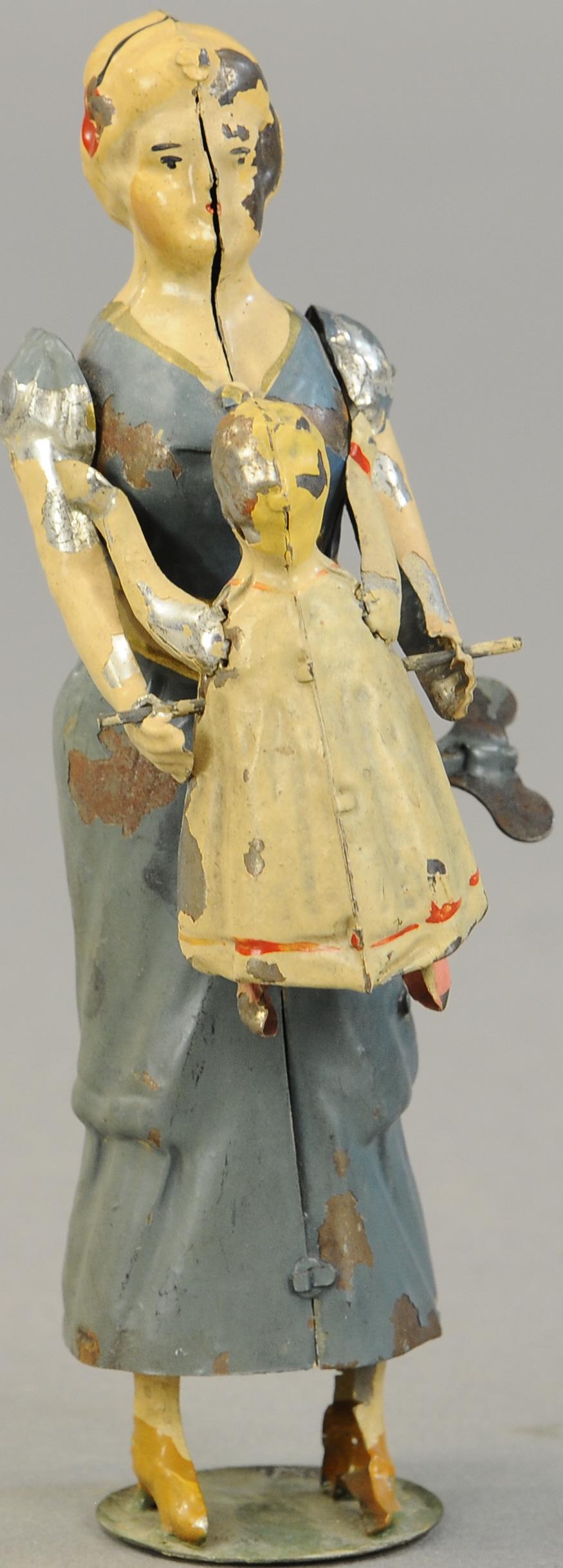 MOTHER LIFTING CHILD TOY: 1314. MOTHER LIFTING CHILD TOY | Germany, likely made by Gunthermann or Assayer, nostalgic clockwork action of mother playing with child. 7 " | (VG - Exc. Cond.) | $500 - $750