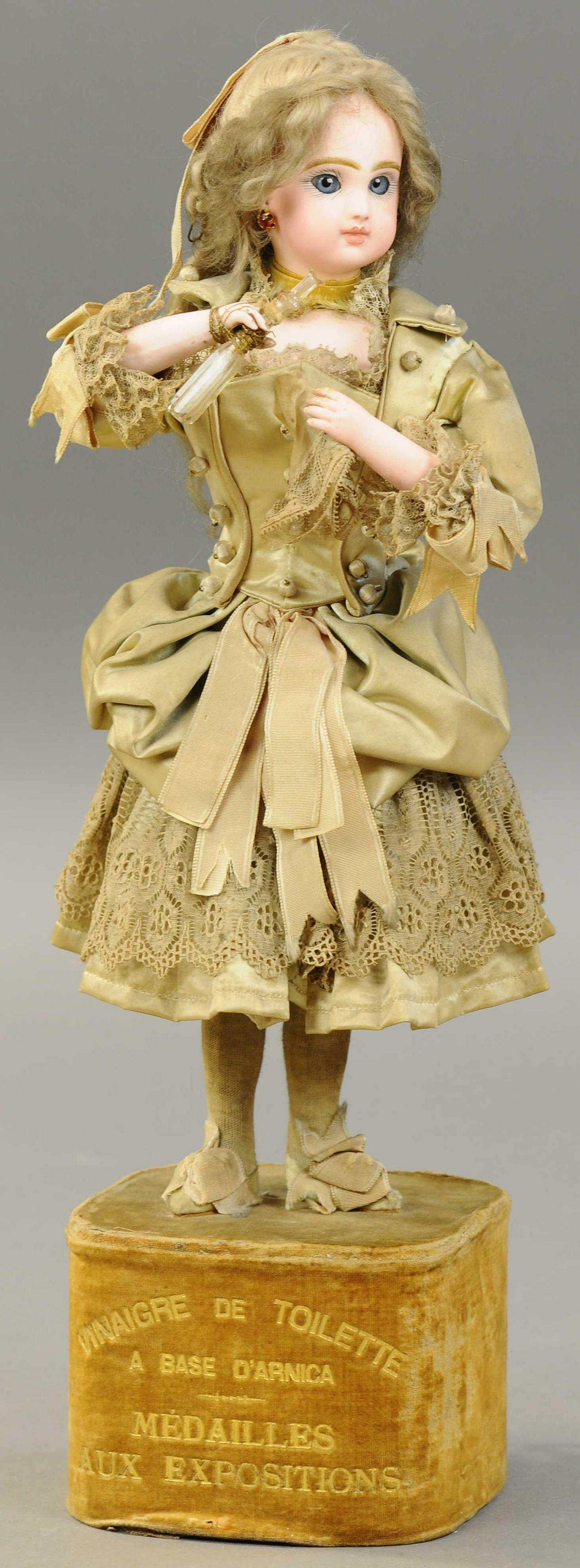 LADY W/ COLOGNE & HANDKERCHIEF AUTOMATON: 1326. LADY W/ COLOGNE & HANDKERCHIEF AUTOMATON | Labert, JUMEA, head musical wind-up, movement depicts woman pouring perfume from bottle to her handkerchief, then smelling its fragrance, stands atop v