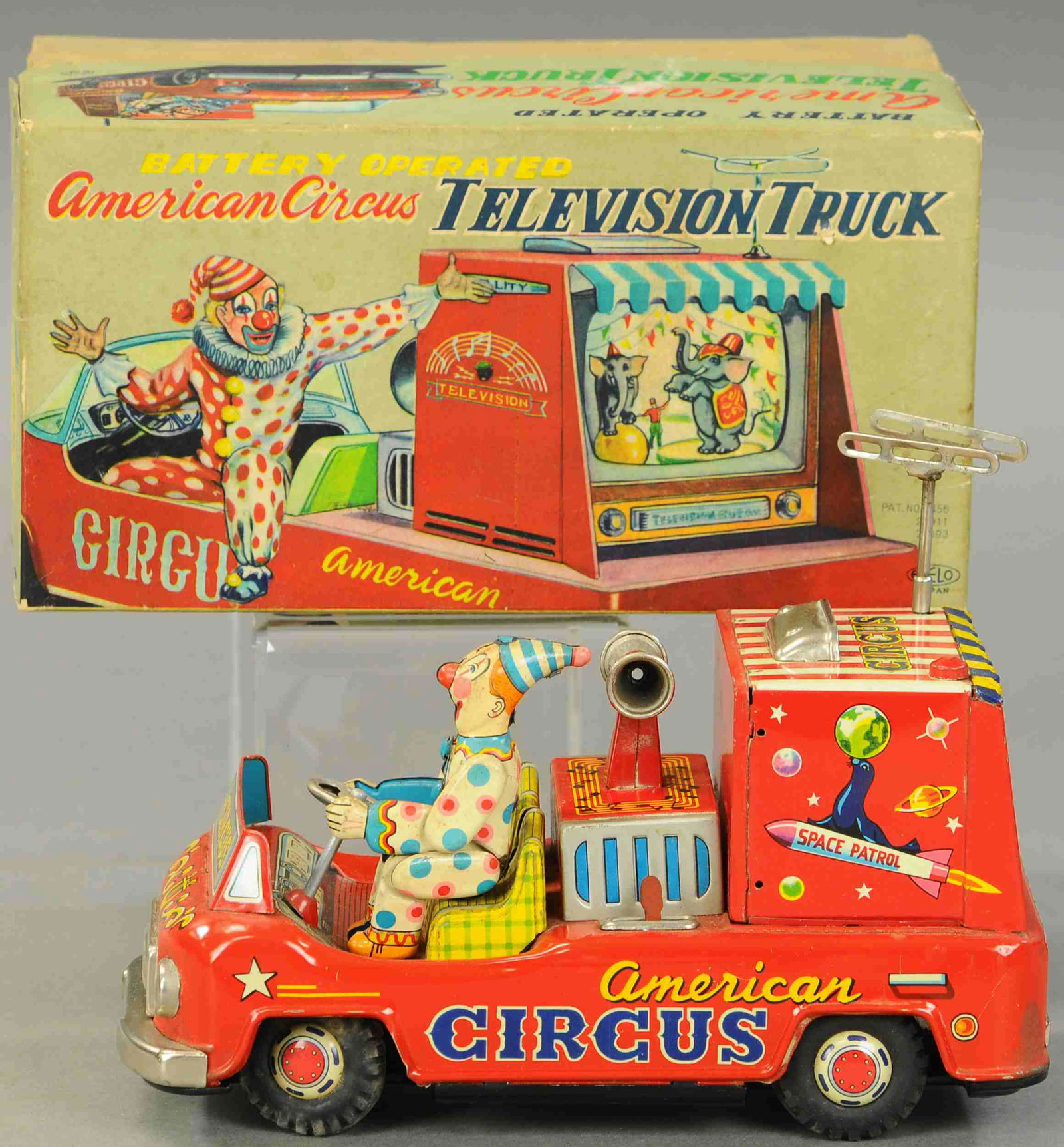 JAPANESE AMERICAN CIRCUS TELEVISION TRUCK: 1391. JAPANESE AMERICAN CIRCUS TELEVISION TRUCK | Japan, battery operated, tested and working. 9.5" l. | Box is overall in (Exc. Cond.), Toy is (Pristine-Near Mint Cond.) | $300 - $500