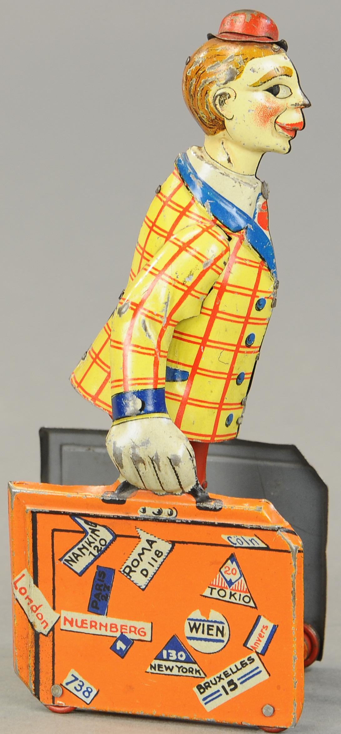 DISTLER TRAVELER W/ LUGGAGE: 1443. DISTLER TRAVELER W/ LUGGAGE | 7.5" h. | (VG - Exc. Cond.) | $700 - $1,000