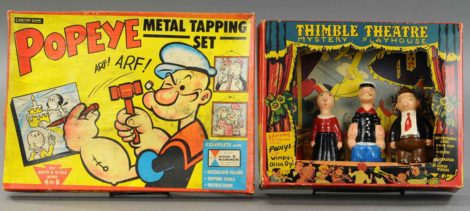 BOXED POPEYE THIMBLE THEATER & METAL TAPPING KIT: 1516. BOXED POPEYE THIMBLE THEATER & METAL TAPPING KIT | Figures 5.5" h., box 10" x 12" | Tear to portion of cardboard stage, overall (Exc. Cond.) | $700 - $1,000