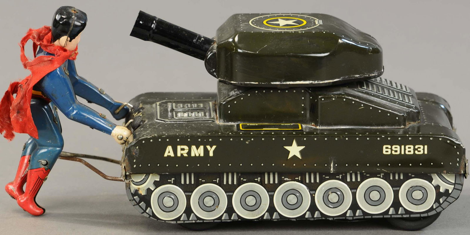 LINEMAR SUPERMAN TANK: 1522. LINEMAR SUPERMAN TANK | Battery operated, very desirable toy is in working condition with nice motion and whimsical action. 4.5" h. | Working in overall (VG Cond.) | $1,500 - $2,500