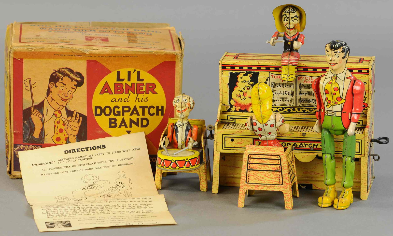 BOXED UNIQUE ART LIL ABNER BAND W/ INSTRUCTIONS: 1588. BOXED UNIQUE ART LIL ABNER BAND W/ INSTRUCTIONS | Complete with original paper instructions. 8" | Box flap detached, (Exc.-Pristine Cond.) | $300 - $400