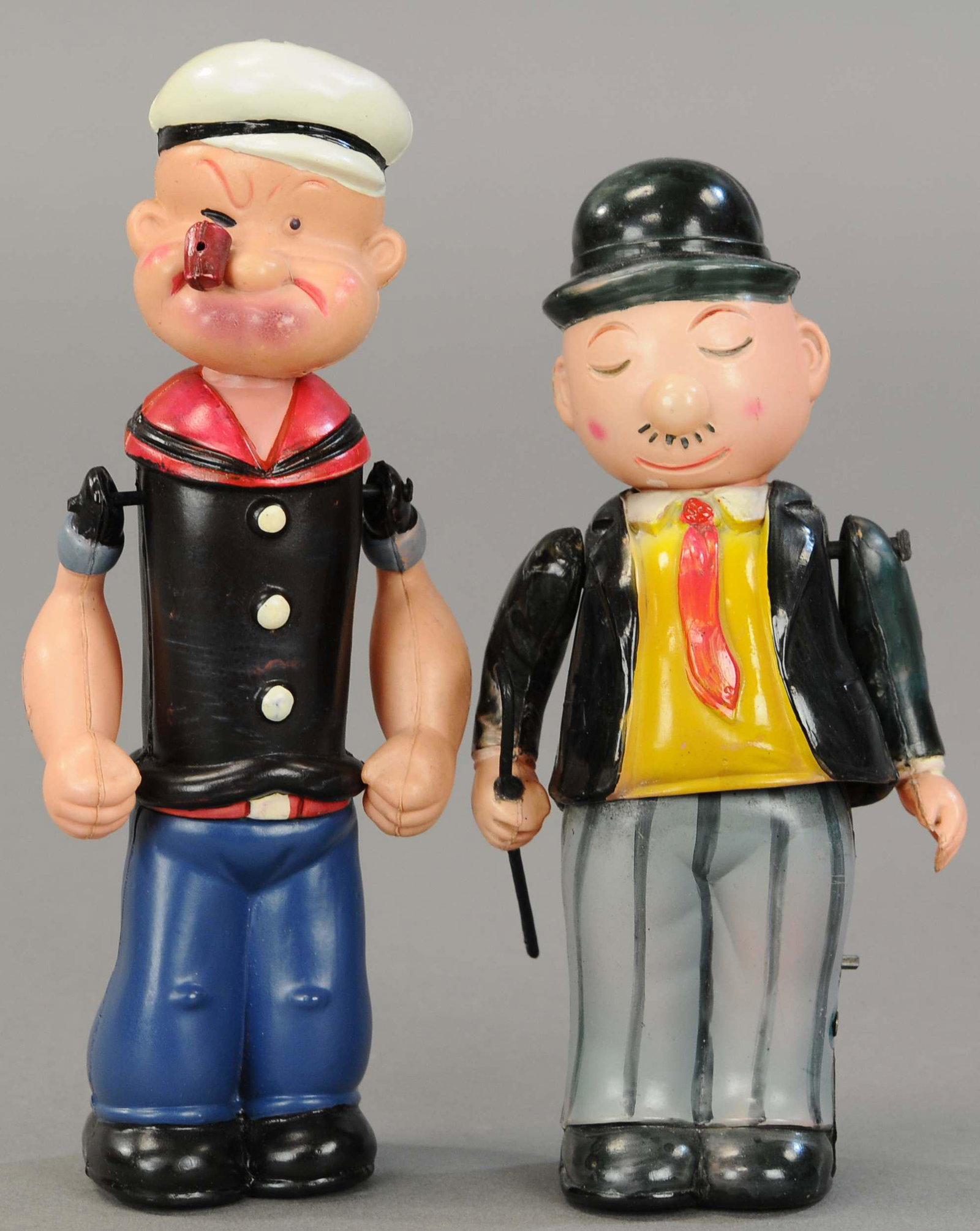 LARGE CELLULOID POPEYE & WHIMPY WIND-UPS: 1625. LARGE CELLULOID POPEYE & WHIMPY WIND-UPS | Nice pair of wind-up walker figures. 8" | (Pristine Cond.) | $400 - $600
