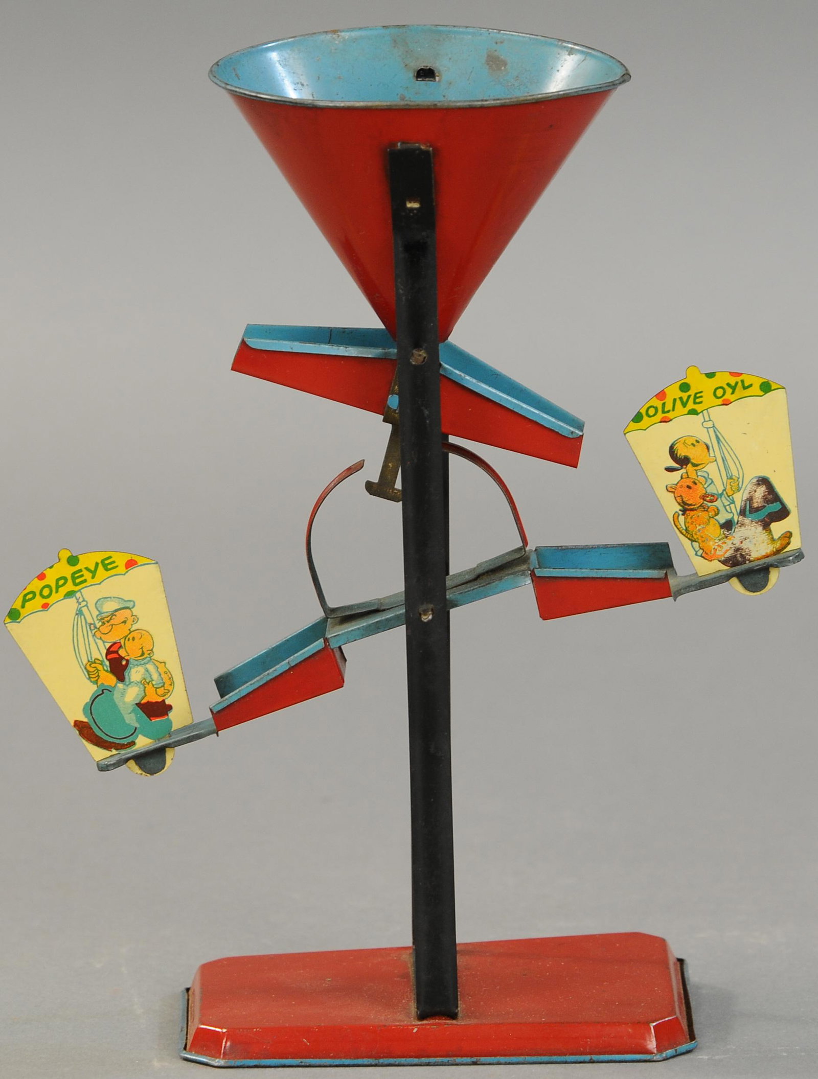 POPEYE & OLIVE OYL SAND TOY: 1680. POPEYE & OLIVE OYL SAND TOY | Unusual Popeye toy variation, gravity fed sand toy. 9.5" h. | (Exc. Cond.) | $200 - $300
