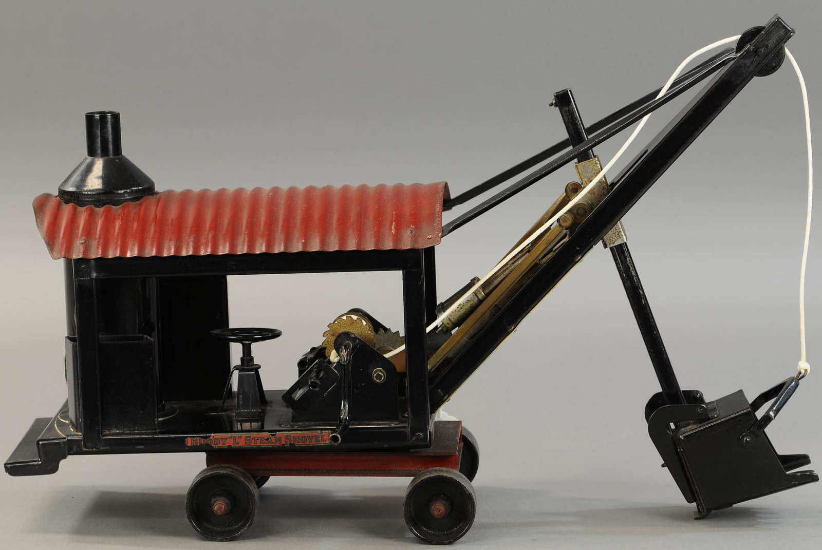 BUDDY L IMPROVED STEAM SHOVEL: 1830. BUDDY L IMPROVED STEAM SHOVEL | 20" l. | (Exc. Cond.) | $600 - $900