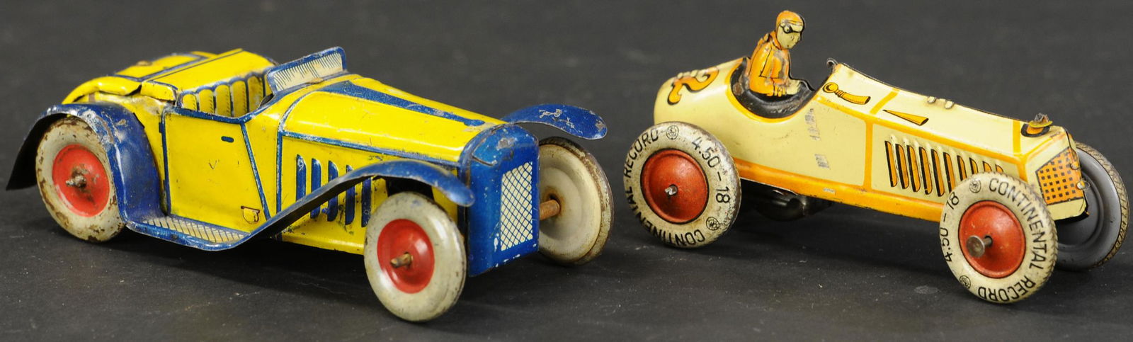 TWO SMALL GERMAN RACER AUTOS: 2035. TWO SMALL GERMAN RACER AUTOS | Lot includes a Gunthermann roadster and a small friction driven race car #32, likely made by Kellermann. 5" l. | Touch-ups to paint on Gunthermann auto, other in (