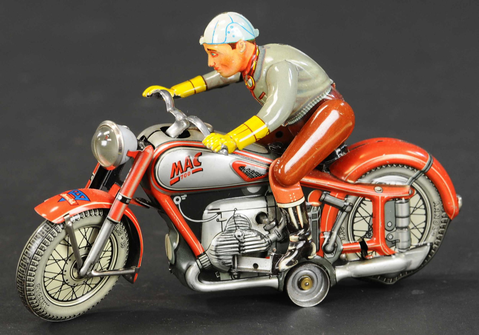 ARNOLD MAC 700 SERIES CYCLE: 2036. ARNOLD MAC 700 SERIES CYCLE | Desirable red version. 8" l. | (Pristine Condition) | $600 - $800 | Provenance: Sam Downey Collection.