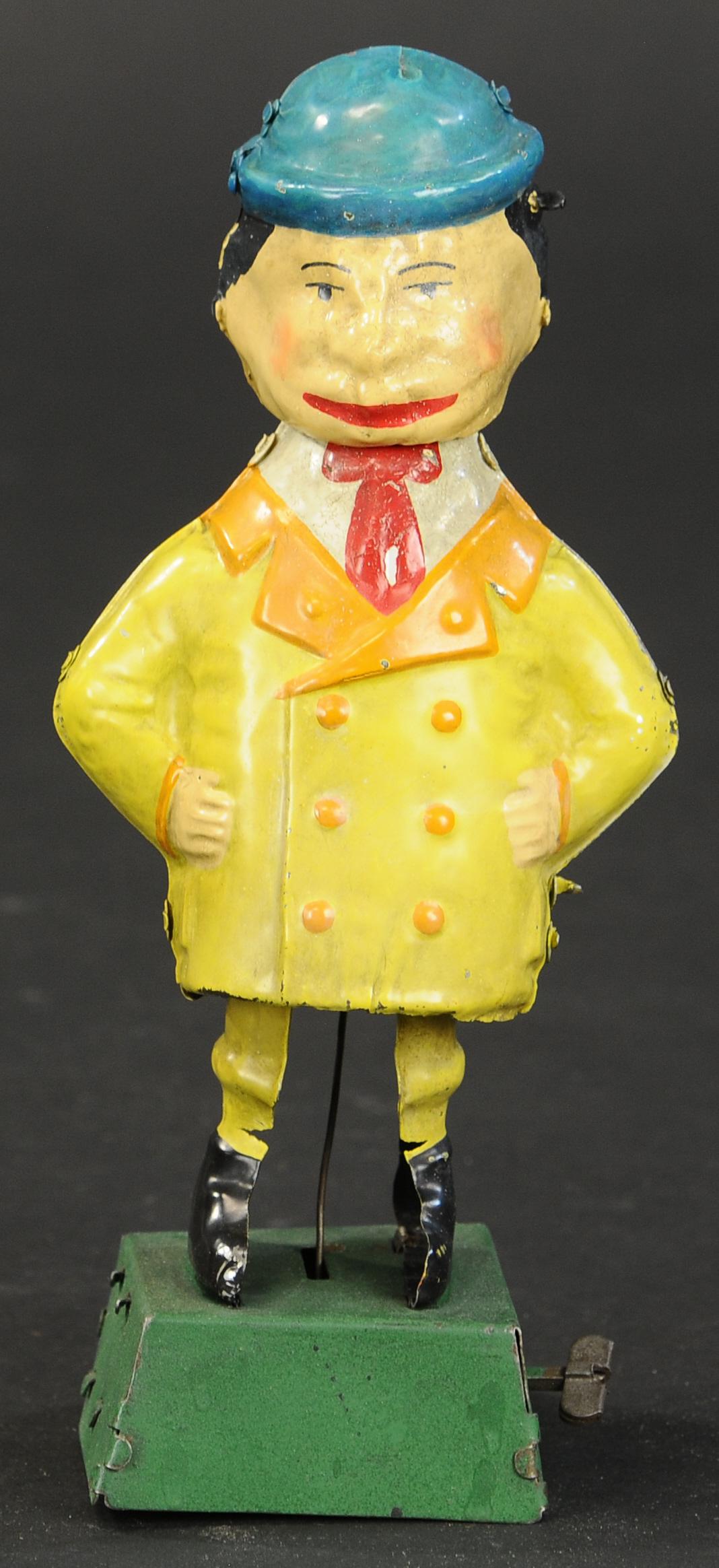 GERMAN TIN BOWING CHINAMAN: 2045. GERMAN TIN BOWING CHINAMAN | Unusual example, wind-up causes man to lean forward and back at waist as if bowing. 8" l. | Restored. | $200 - $400 | Provenance: Sam Downey Collection.
