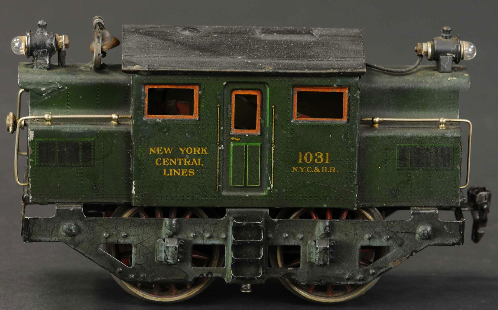 MARKLIN 1031 ELECTRIC LOCO: 2112. MARKLIN 1031 ELECTRIC LOCO | Electric, gauge 1. 8.5" l. | Lights re-attached with touch-up in areas at ends, (Very Good Condition) | $300 - $500 | Provenance: Sam Downey Collection.