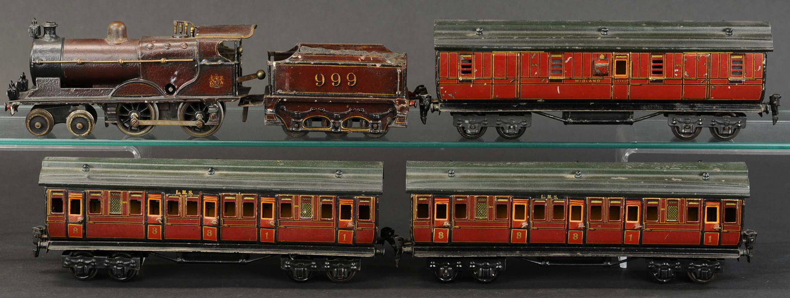 MARKLIN ENGLISH MARKET PASSENGER SET: 2116. MARKLIN ENGLISH MARKET PASSENGER SET | Clockwork, gauge O. Loco & tender 14" l. | (Very Good to Excellent Condition) | $500 - $750 | Provenance: Sam Downey Collection.