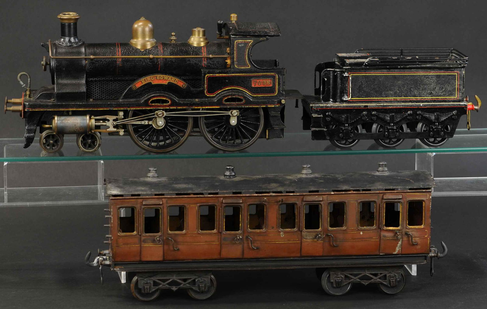 BING GAUGE III KING EDWARD AND COACH: 2120. BING GAUGE III KING EDWARD AND COACH | Live steam, gauge 3. Loco & tender 24" l. | Loco has overpaint on black at chipped areas, though still retains a good amount of original paint, tender varn