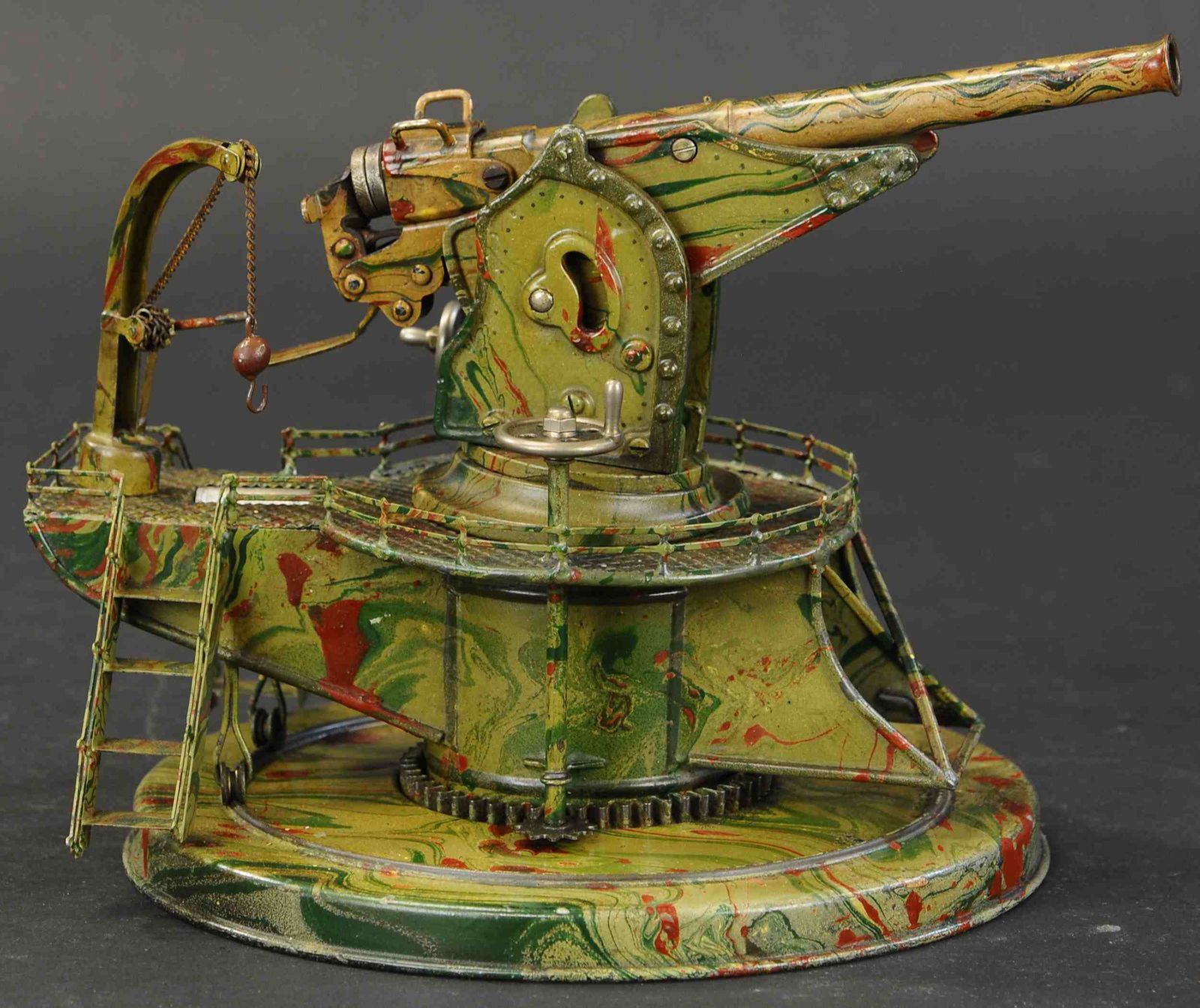 MARKLIN CAMOUFLAGE COASTAL CANNON: 2182. MARKLIN CAMOUFLAGE COASTAL CANNON | Hand painted in impressive German camouflage pattern, long barrel version with small compartment underneath crane for storing two shells that actually fire wi