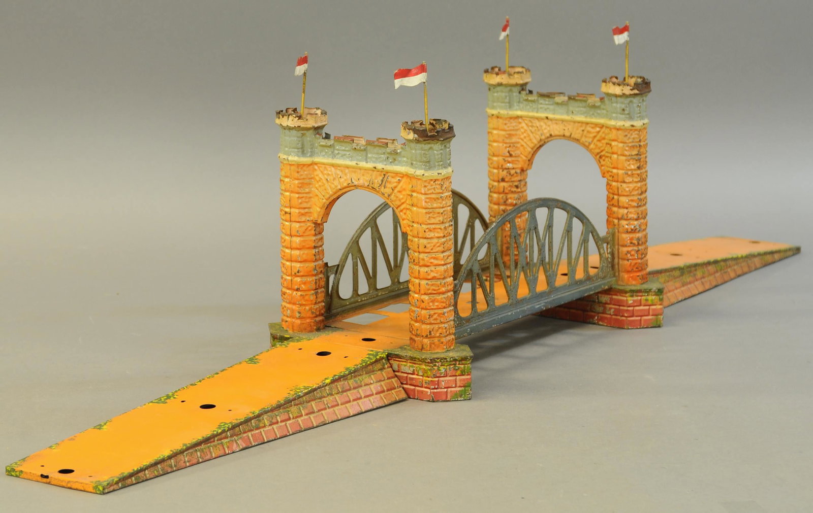 BING SINGLE SPAN TOWER BRIDGE: 2221. BING SINGLE SPAN TOWER BRIDGE | Gauge O, nice accessory is missing track, but paint appears all original. 46" l. | Flags are replaced, otherwise in (Very Good to Excellent Condition) | $800 - $1