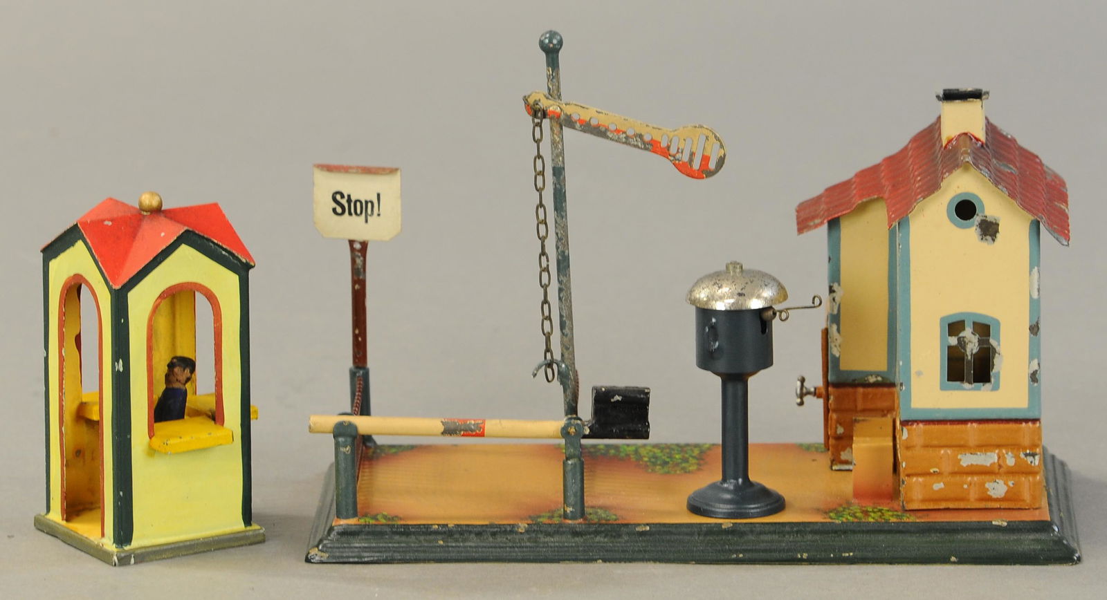 TWO MARKLIN GUARD'S SHACKS: 2223. TWO MARKLIN GUARD'S SHACKS | Hand painted. 9" w. | Bell is repainted or replaced, otherwise both in (Very Good to Excellent Condition) | $400 - $600 | Provenance: Sam Downey Collection.