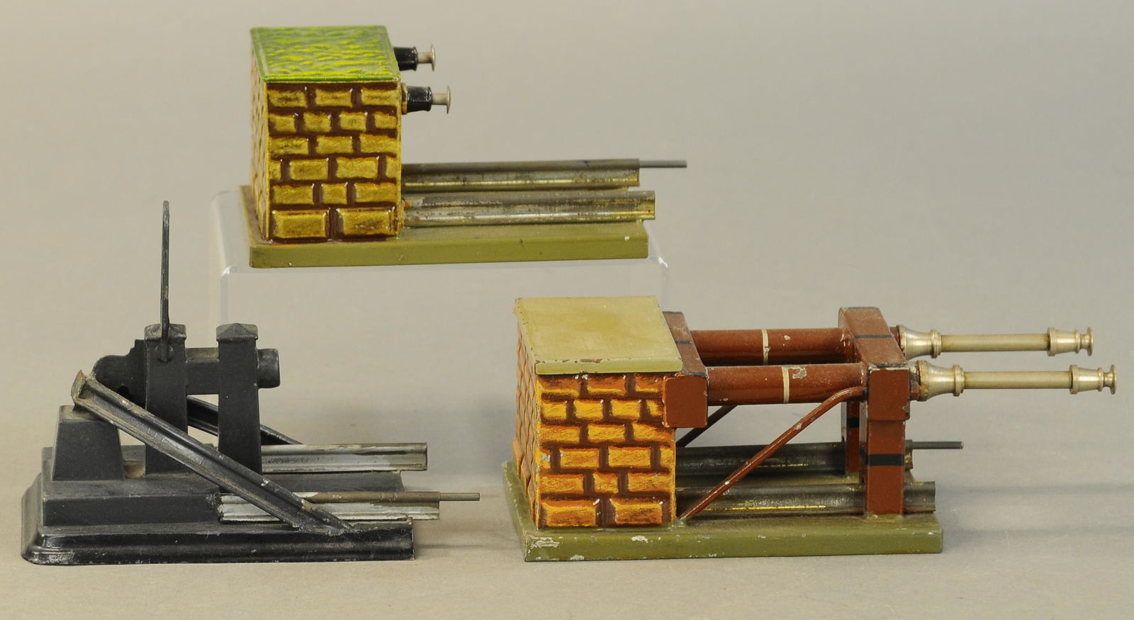 BING BUMPER STOP & TWO MARKLIN BUFFER STOPS: 2239. BING BUMPER STOP & TWO MARKLIN BUFFER STOPS | Bumper stop is standard gauge, buffer stops are gauge 1. 8" l. | (Excellent Condition) | $200 - $300 | Provenance: Sam Downey Collection.