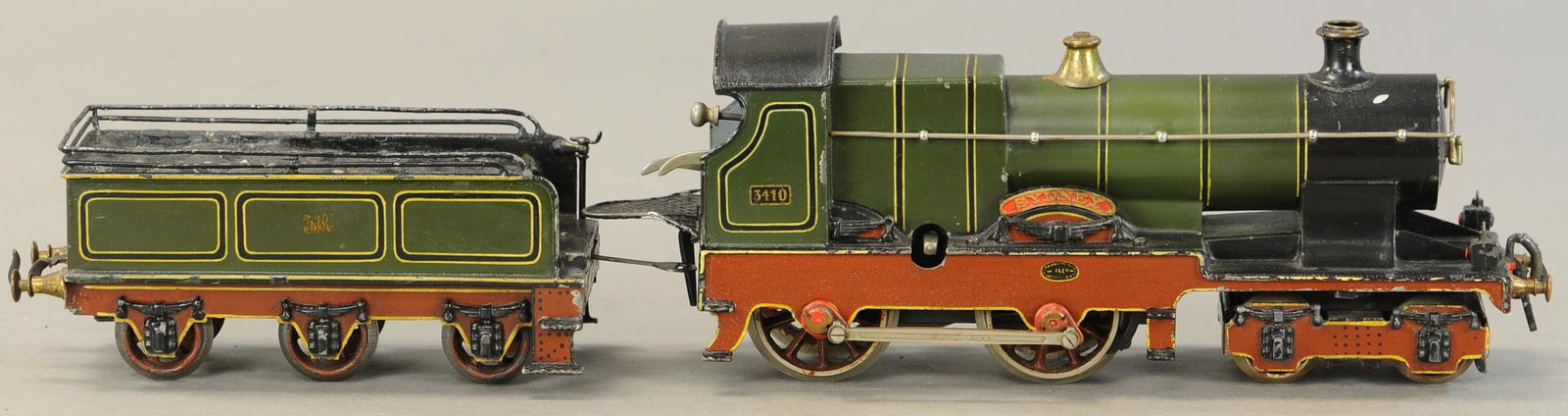 BING FOR BASSETT LOWKE SYDNEY LOCOMOTIVE: 2263. BING FOR BASSETT LOWKE SYDNEY LOCOMOTIVE | Clockwork, gauge 1. Loco & tender 21" l. | Smoke stack seems reattached, some minor touch-ups, overall in (Very Good to Excellent Condition) | $800 - $