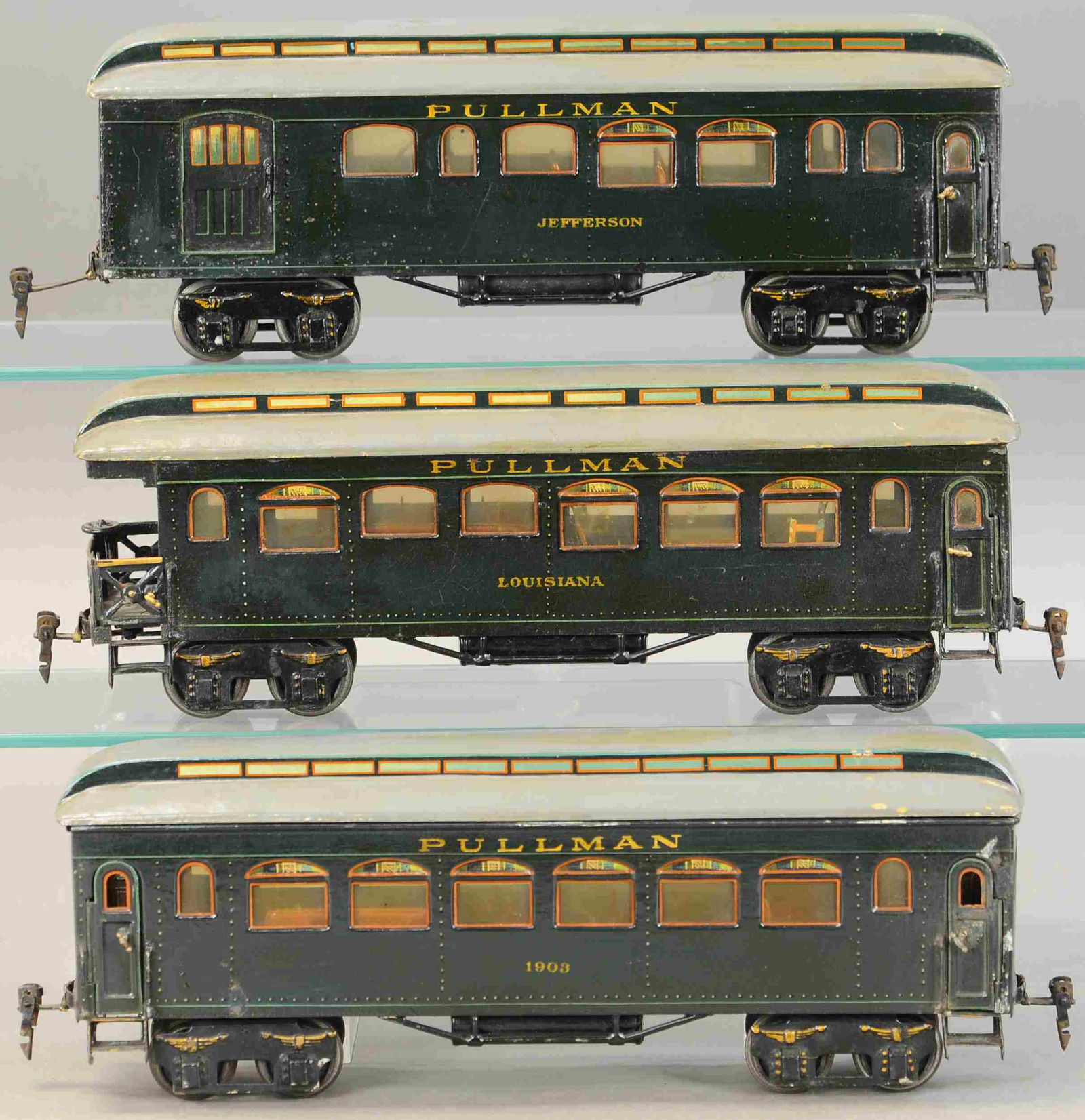 MARKLIN PULLMAN PASSENGER CARS: 2264. MARKLIN PULLMAN PASSENGER CARS | Gauge 1. 14" l. | Appear to be original cars with a heavy varnish, overall in (Exc. Cond.) | $300 - $600 | Provenance: Sam Downey Collection.