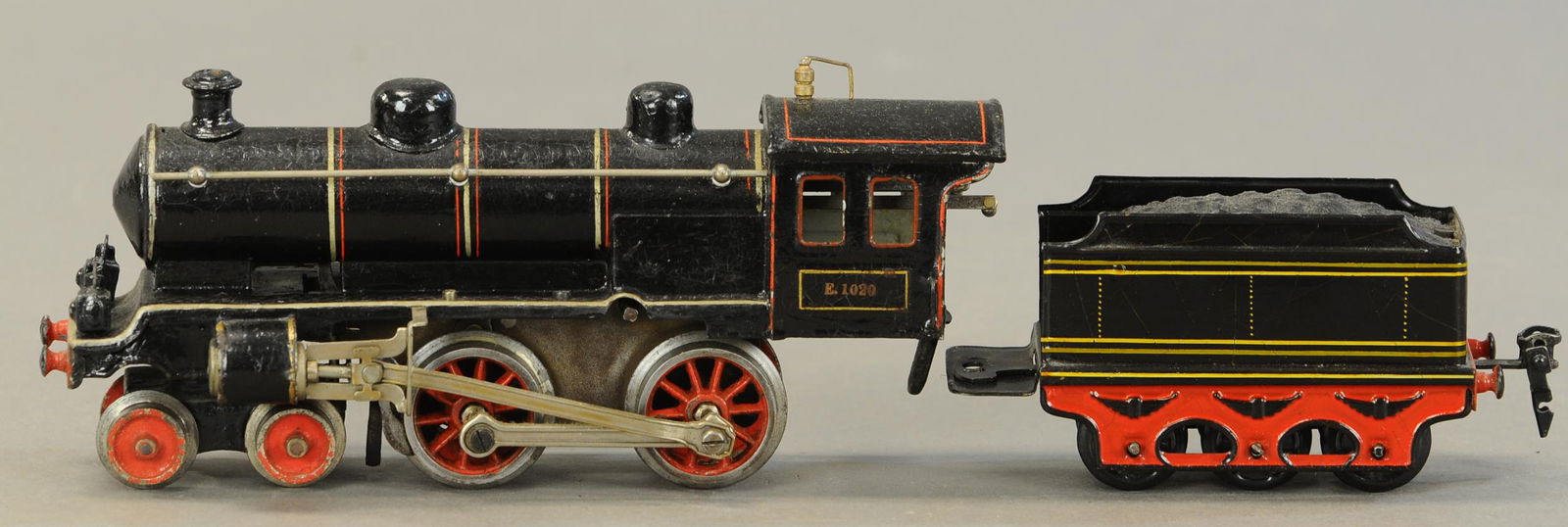 MARKLIN E 1020 LOCOMOTIVE: 2283. MARKLIN E 1020 LOCOMOTIVE | Clockwork, gauge O. Loco & tender 14" l. | Restored. | $500 - $750 | Provenance: Sam Downey Collection.