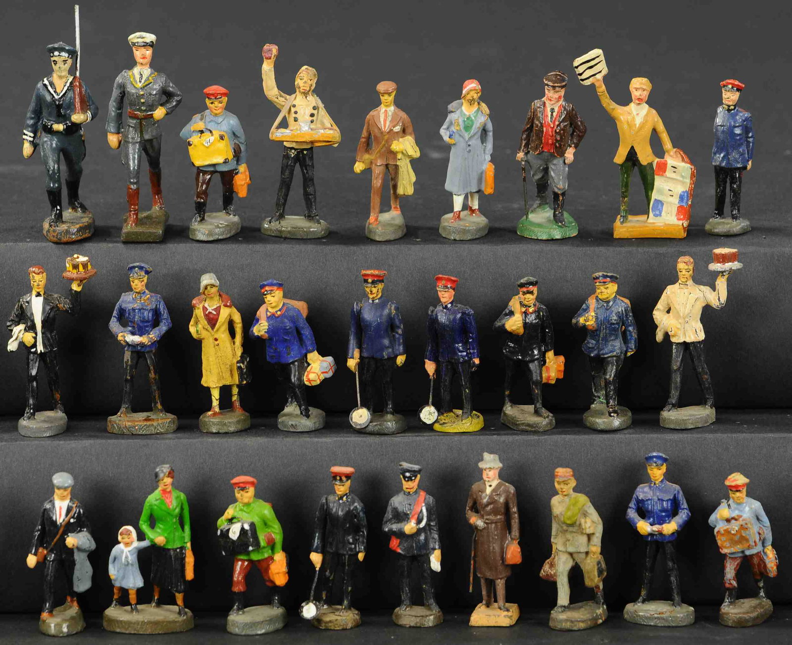 LARGE ASSORTMENT OF COMPOSITION FIGURES: 2304. LARGE ASSORTMENT OF COMPOSITION FIGURES | Mixed sizes and styles, includes some original and some replacements. 2" - 3.5" h. | As noted, sold as-is. | $300 - $600 | Provenance: Sam Downey Collec