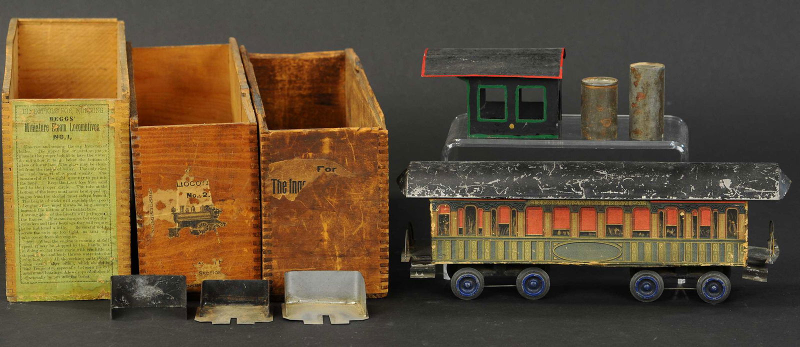 BEGGS COACH, BOXES, AND PARTS: 2334. BEGGS COACH, BOXES, AND PARTS | Original paper side coach is clean, lot also includes three wooden boxes without lids, reproduction coal bunkers and a reproduction cab, sold as-is parts lot. Coa
