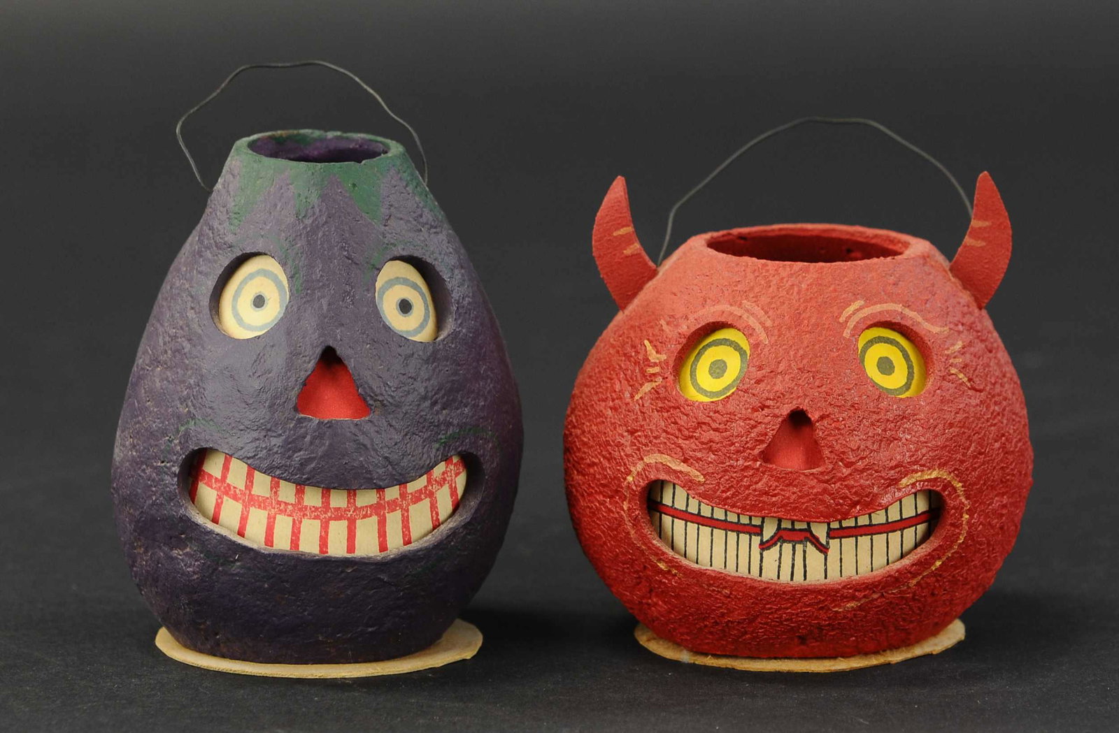 TWO CONTEMPORARY JACK-O-LANTERNS: 2479. TWO CONTEMPORARY JACK-O-LANTERNS | Two Albertson, 1997 Halloween figures. 5"-5.5" h. | (Excellent Condition) | $100 - $300 | Provenance: Sam Downey Collection.