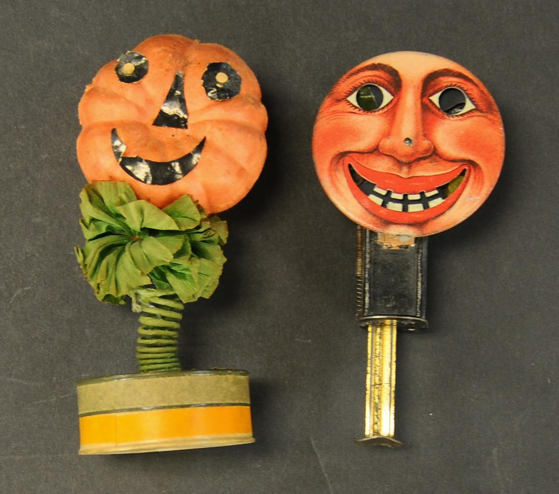 PUMPKIN MAN ON SPRING & PUMPKIN NOISEMAKER: 2493. PUMPKIN MAN ON SPRING & PUMPKIN NOISEMAKER | Smiling face sparkler needs a new flint, pumpkin man has minor touch-up to face. 4.5"-5" h. | (Very Good Condition) | $150 - $300 | Provenance: Sam D