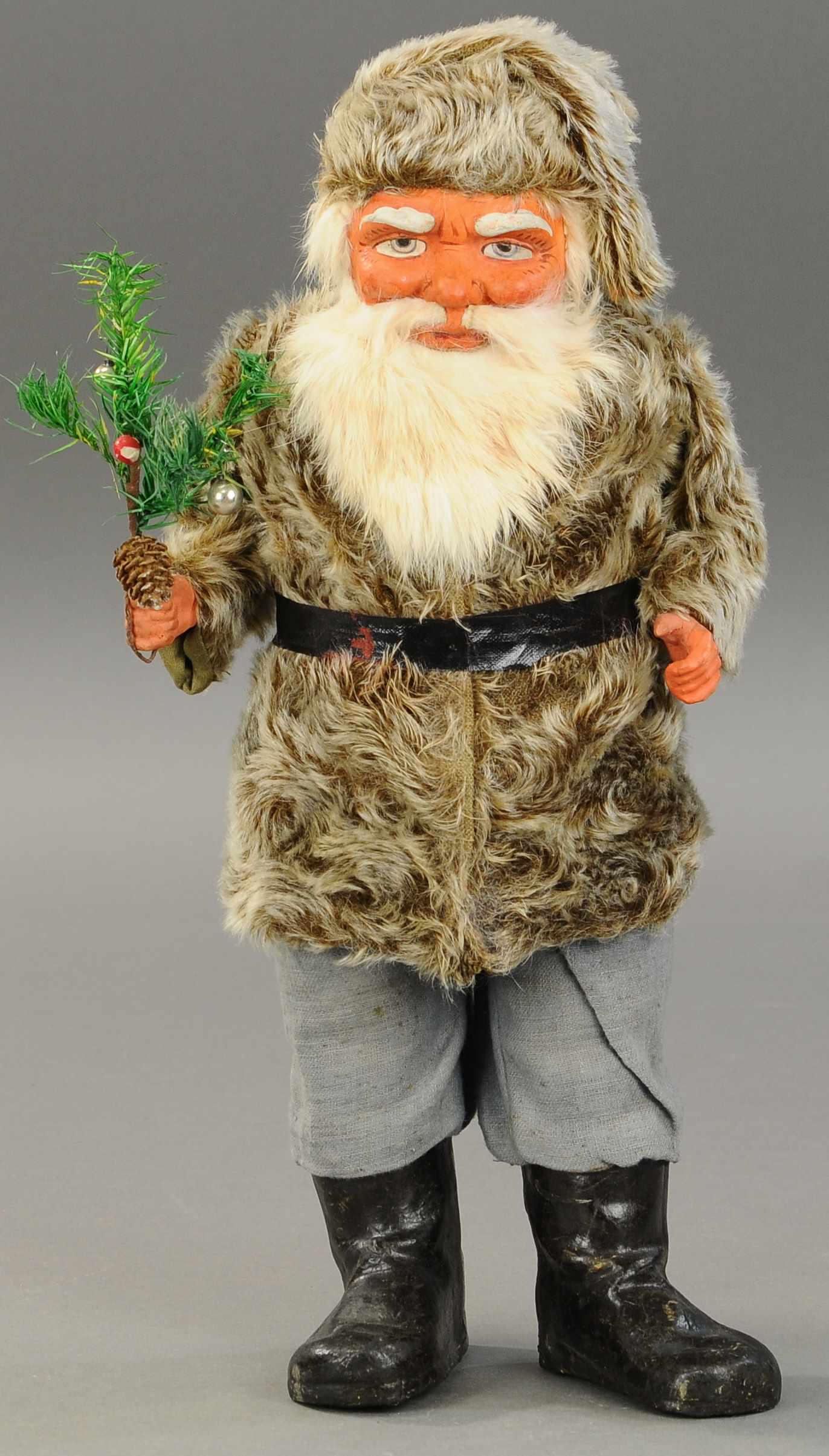 LARGE FUR ROBE SANTA CLAUS: 2501. LARGE FUR ROBE SANTA CLAUS | Germany, composition boots, hands and head, wearing a fine looking, fleece-type robe and cap, rabbit fur beard outlines his stern face w/piercing blue eyes and feath