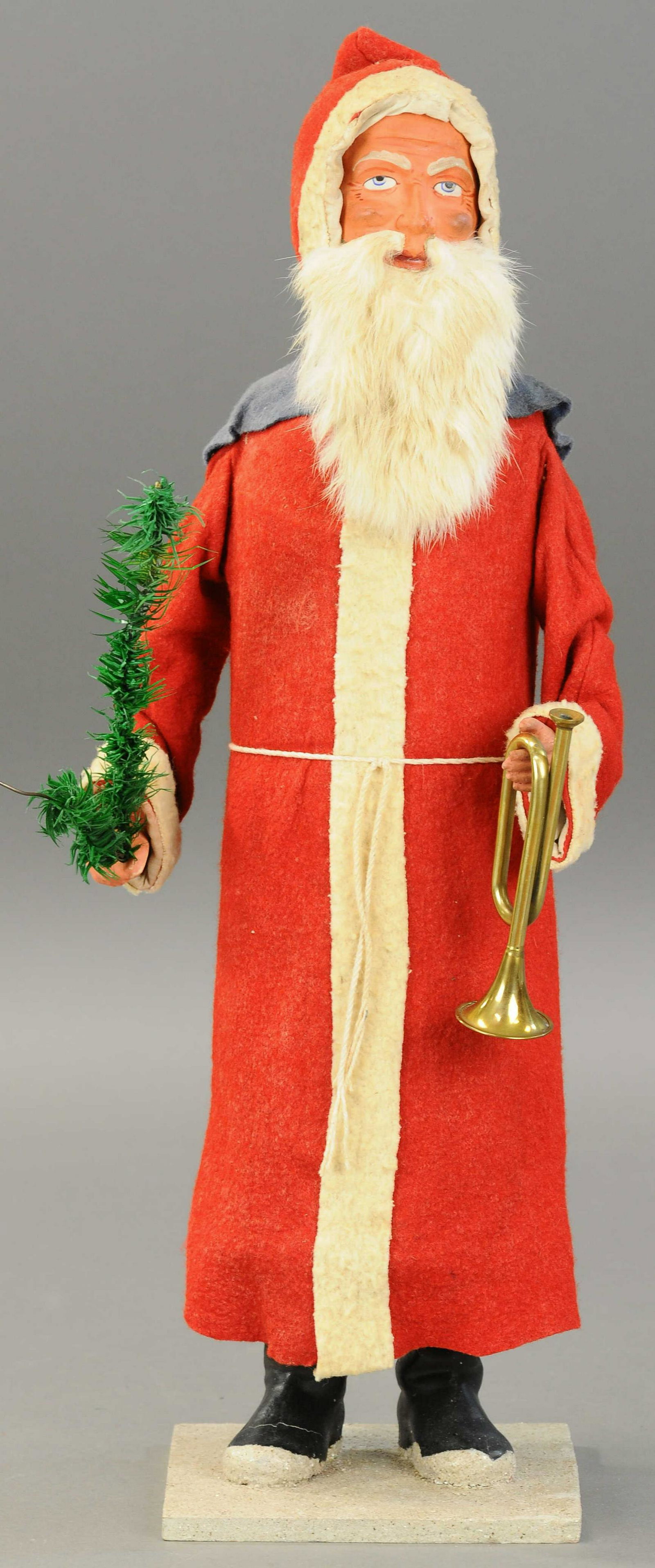 TALL & SLENDER NODDING SANTA CLAUS: 2573. TALL & SLENDER NODDING SANTA CLAUS | Germany, long red robe w/white trim, composition head w/rabbit fur beard, feather tree sprig, and trumpet in hands. 23.5" h. | Has had touch-up to face and w