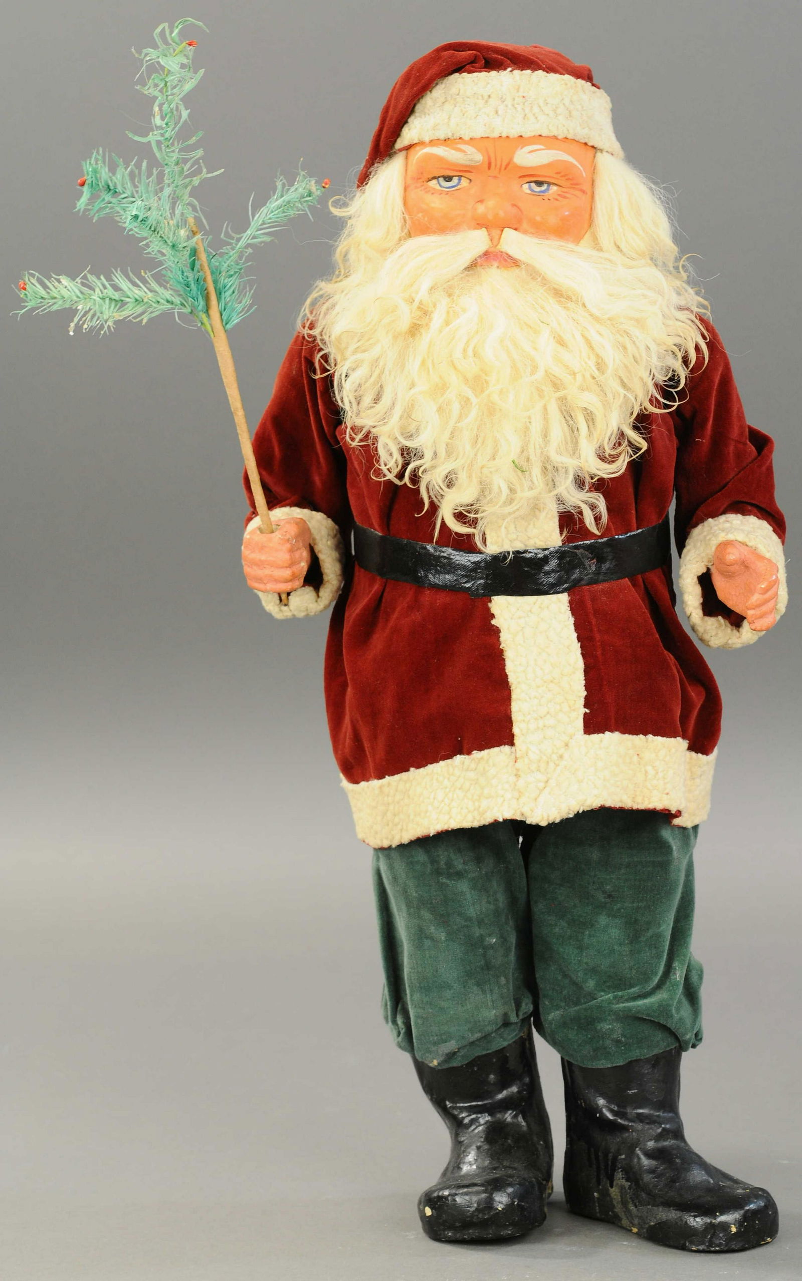 LARGE WOODCUTTER SANTA CANDY CONTAINER: 2600. LARGE WOODCUTTER SANTA CANDY CONTAINER | Big, bushy mohair beard on composition face w/deep blue, kind looking eyes, wearing fine looking red felt robe w/white trim, a rare find in this very lar