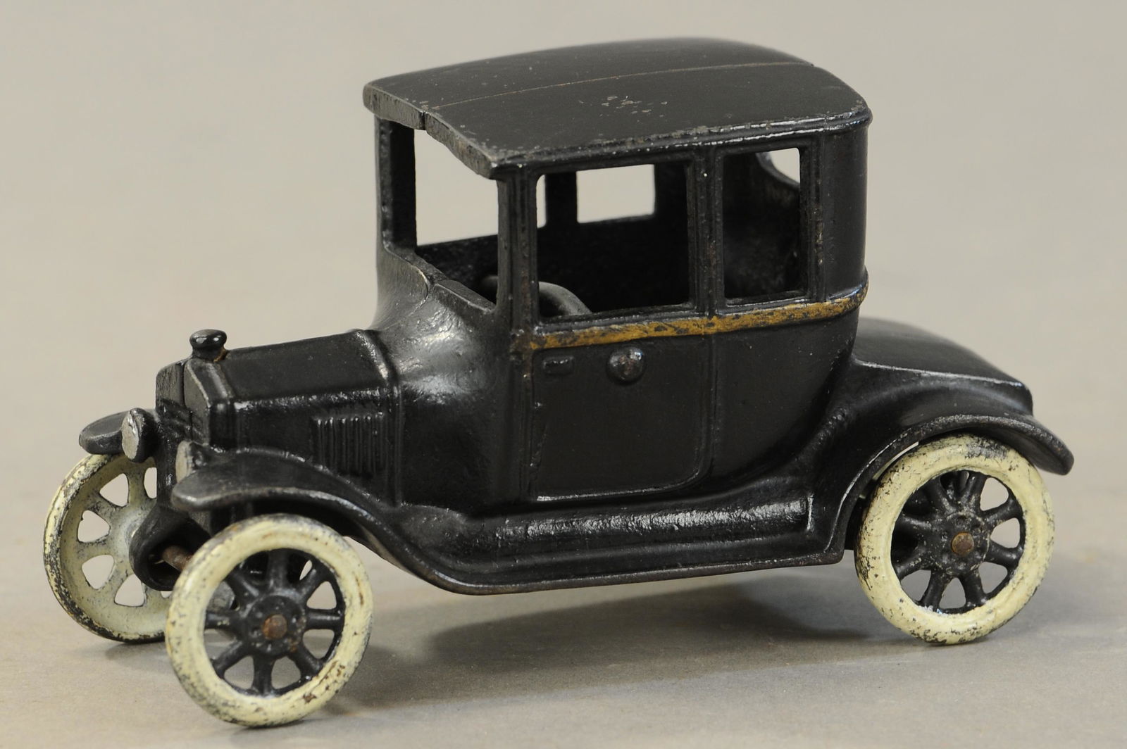 ARCADE FORD MODEL 'T' COUPE: 156. ARCADE FORD MODEL 'T' COUPE| 6" l.| Repainted.| $150 - $300