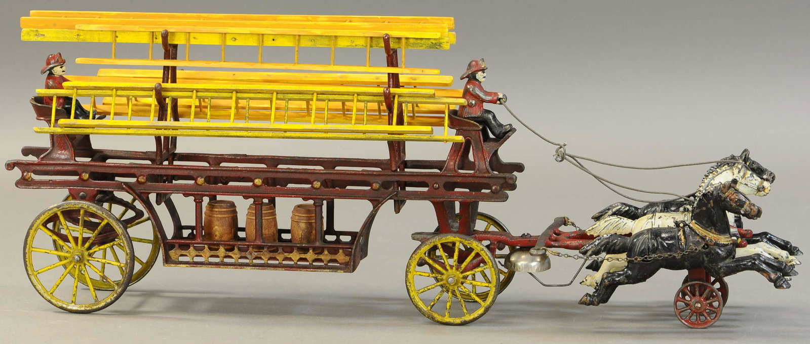 LARGE KENTON LADDER WAGON: 266. LARGE KENTON LADDER WAGON| 24" l.| Small crack to rear seat is glued, otherwise paint appears to be in All Original Condition.| $600 - $1,200
