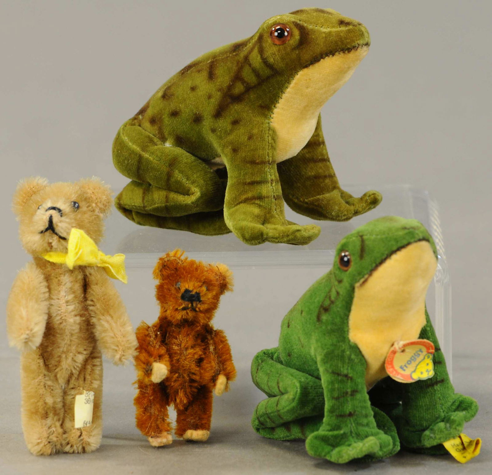 LOT OF FOUR SMALL STUFFED TOYS: 346. LOT OF FOUR SMALL STUFFED TOYS| Lot includes two velveteen Steiff frogs, and two small jointed Teddies [Schuco type].| 3"| (VG Cond.)| $150 - $300