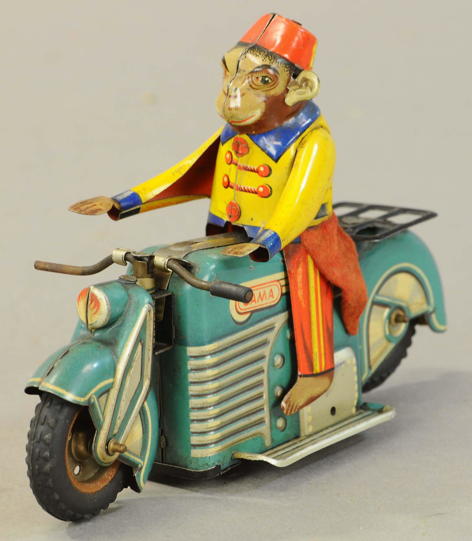 GAMA TRICK MONKEY MOTORCYCLIST: 14. GAMA TRICK MONKEY MOTORCYCLIST | 6.5" l. | All Original Condition. | $200 - $400