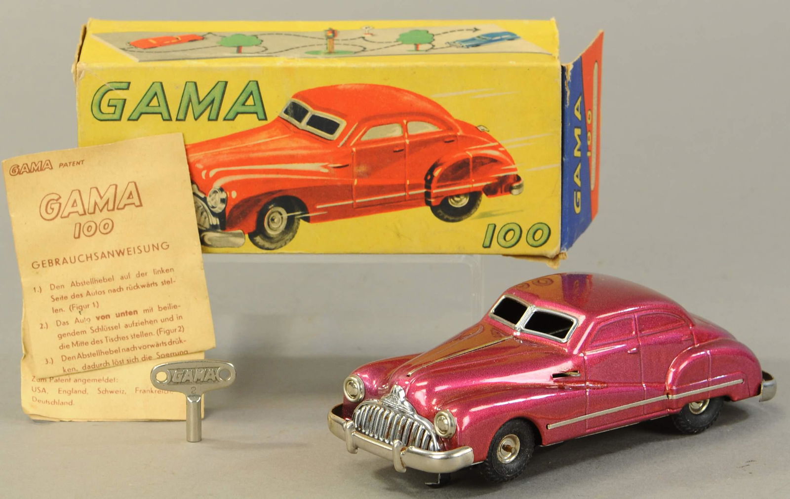 BOXED SCHUCO GAMA 100 AUTOMOBILE: 16. BOXED SCHUCO GAMA 100 AUTOMOBILE | 6.5" l. | Includes original instructions, end flaps torn, otherwise in All Original Condition. | $100 - $200