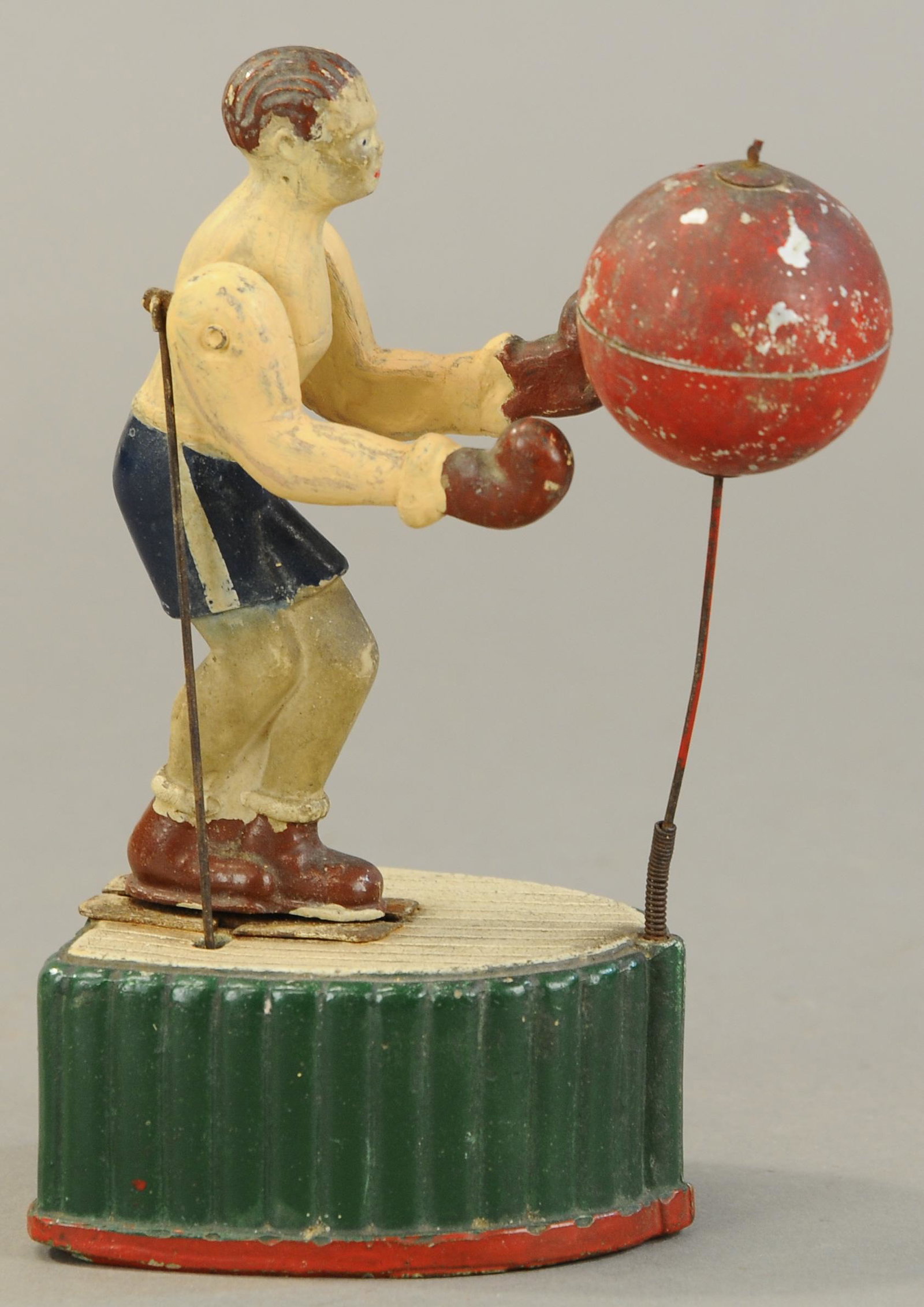 PRIMO CARNERA BOXER PUNCHING BAG: 84. PRIMO CARNERA BOXER PUNCHING BAG | 8" h. | All Original Condition. | $100 - $200