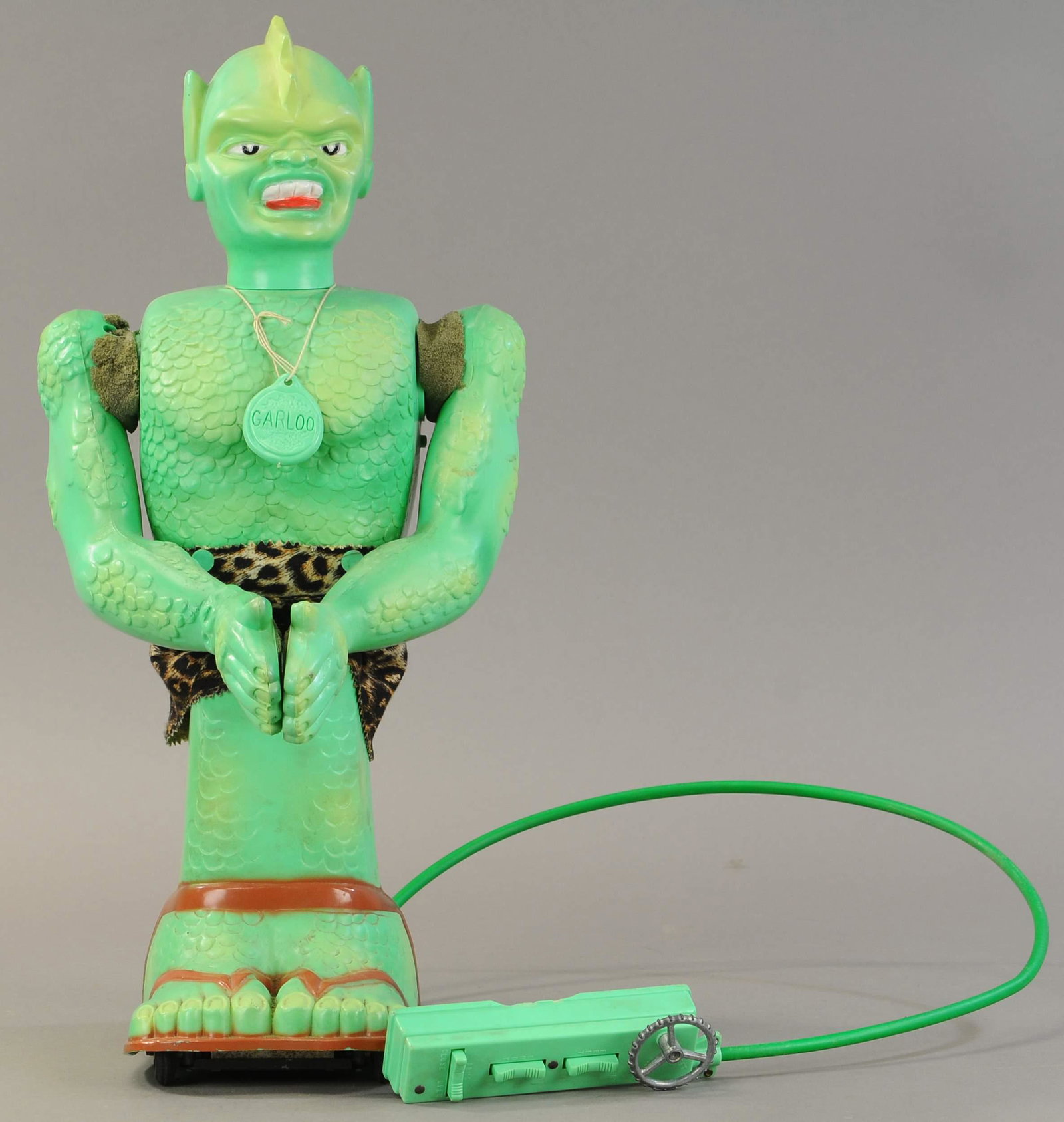 MARX THE GREAT GARLOO BATTERY OP: 102. MARX THE GREAT GARLOO BATTERY OP | 23" h. | Battery cover is missing, toy is battery tested causes bending motion, forward and backwards, however arms do not move. | $100 - $200