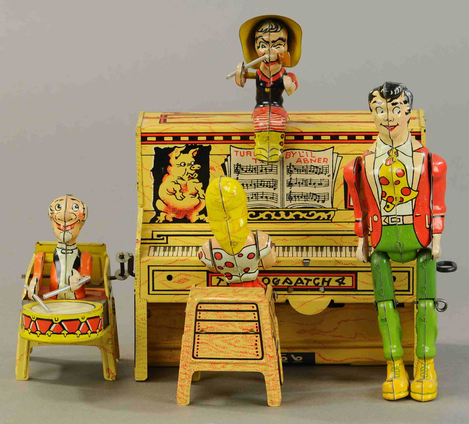 UNIQUE ART LIL ABNER DOGPATCH BAND: 194. UNIQUE ART LIL ABNER DOGPATCH BAND | 9" l. | All Original Condition. | $125 - $250