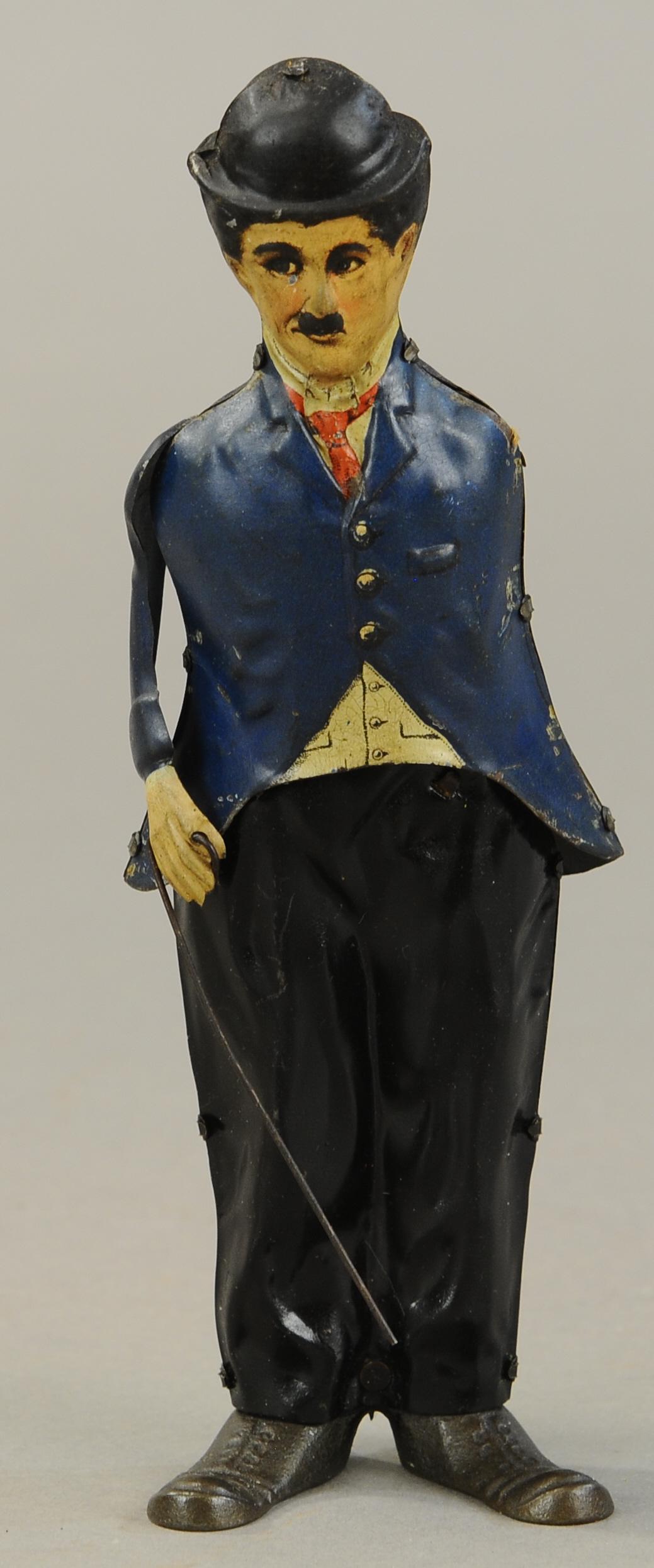 B&R GERMANY CHARLIE CHAPLIN WALKER: 204. B&R GERMANY CHARLIE CHAPLIN WALKER | 8" h. | Missing one arm, otherwise working in All Original Condition. | $150 - $300