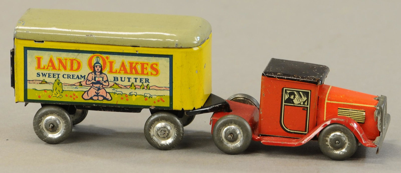 LINDSTROM LAND-O-LAKES TRACTOR TRAILER: 205. LINDSTROM LAND-O-LAKES TRACTOR TRAILER | 6.5" l. | All Original Condition. | $150 - $300