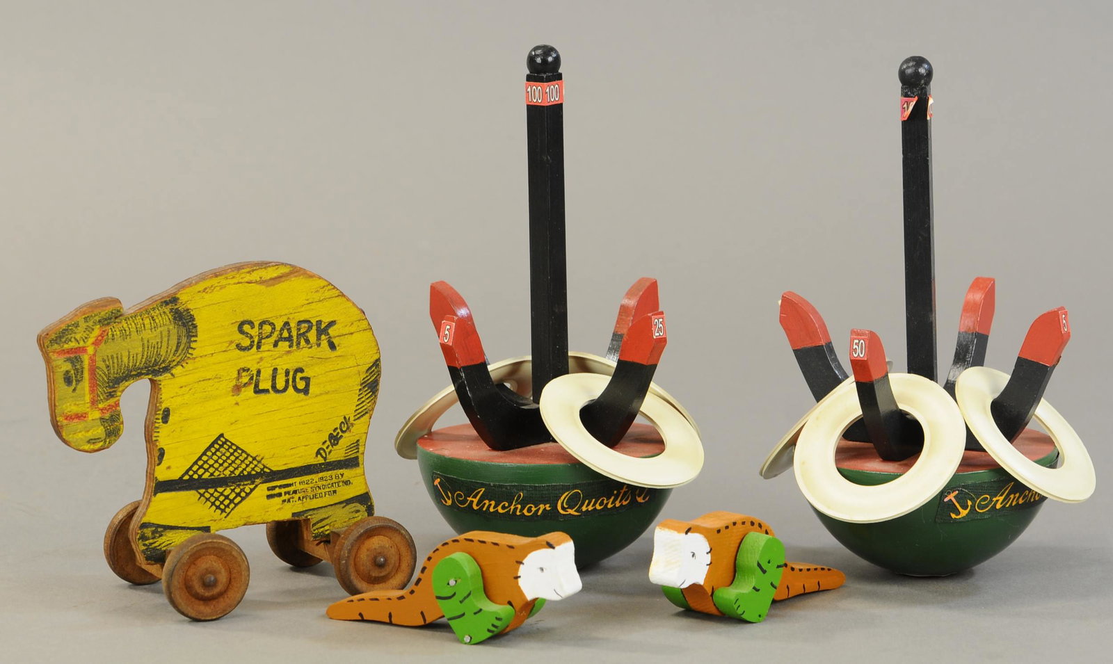 ANCHOR QUOITS GAME, SPARK PLUG & TWO MONKEYS: 216. ANCHOR QUOITS GAME, SPARK PLUG & TWO MONKEYS | 5" - 8" h. | All Original Condition. | $100 - $200